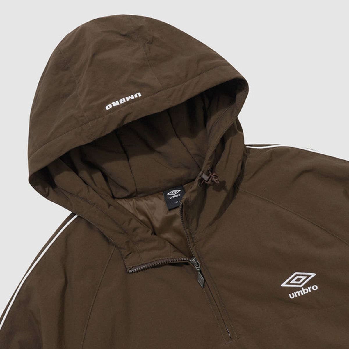 엄브로(UMBRO) 유니온 트랙 스탠넥 패딩 후드 아노락 브라운 UQ321CWT95