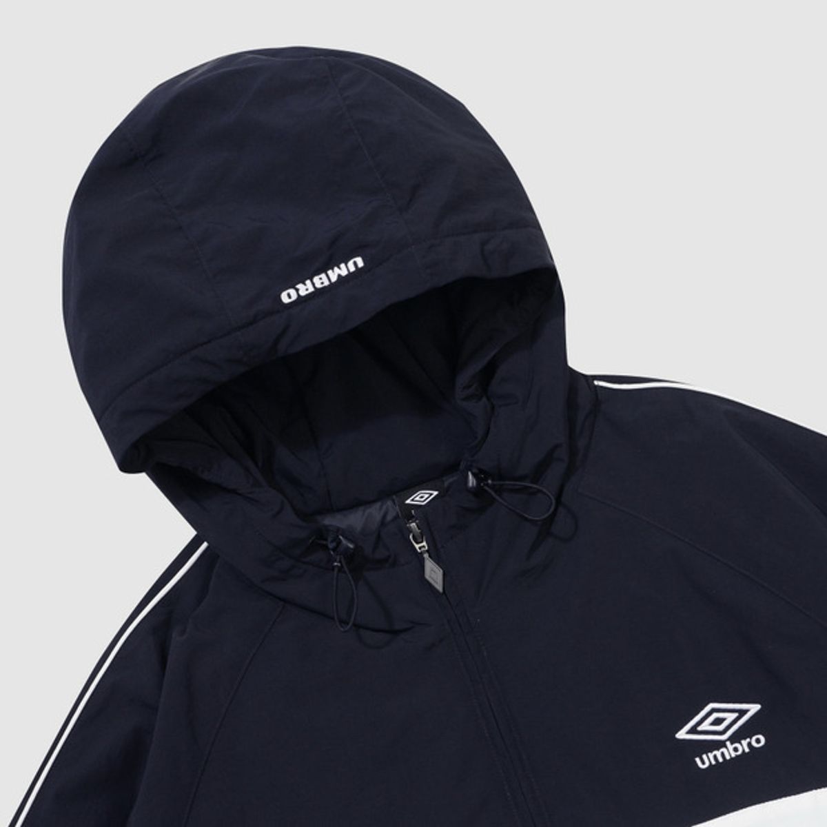 엄브로(UMBRO) 유니온 트랙 스탠넥 패딩 후드 아노락 네이비 UQ321CWT95