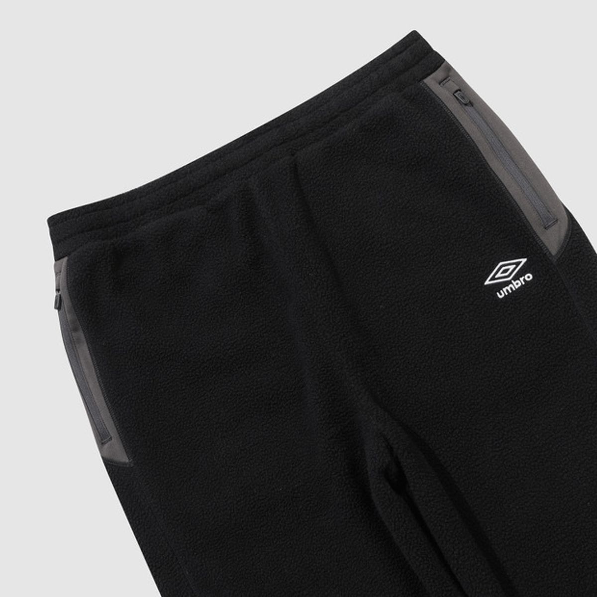 엄브로(UMBRO) 하이브리드 플리스 조거 팬츠 블랙 UQ421SFPO2