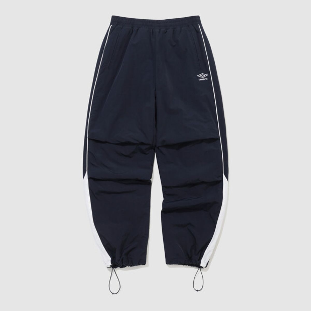 엄브로(UMBRO) 유니온 트랙 와이드 & 조거 2WAY 패딩 우븐 팬츠 네이비 UQ321CPT94