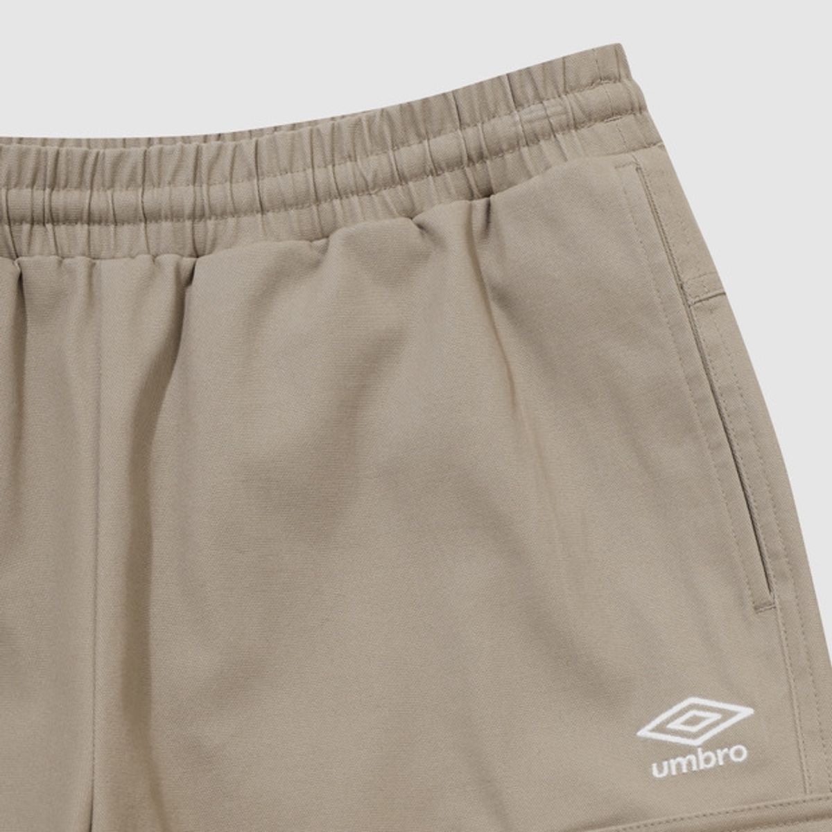 엄브로(UMBRO) 헤비 면트윌 카고 조거 팬츠 베이지 UQ423CPTN1