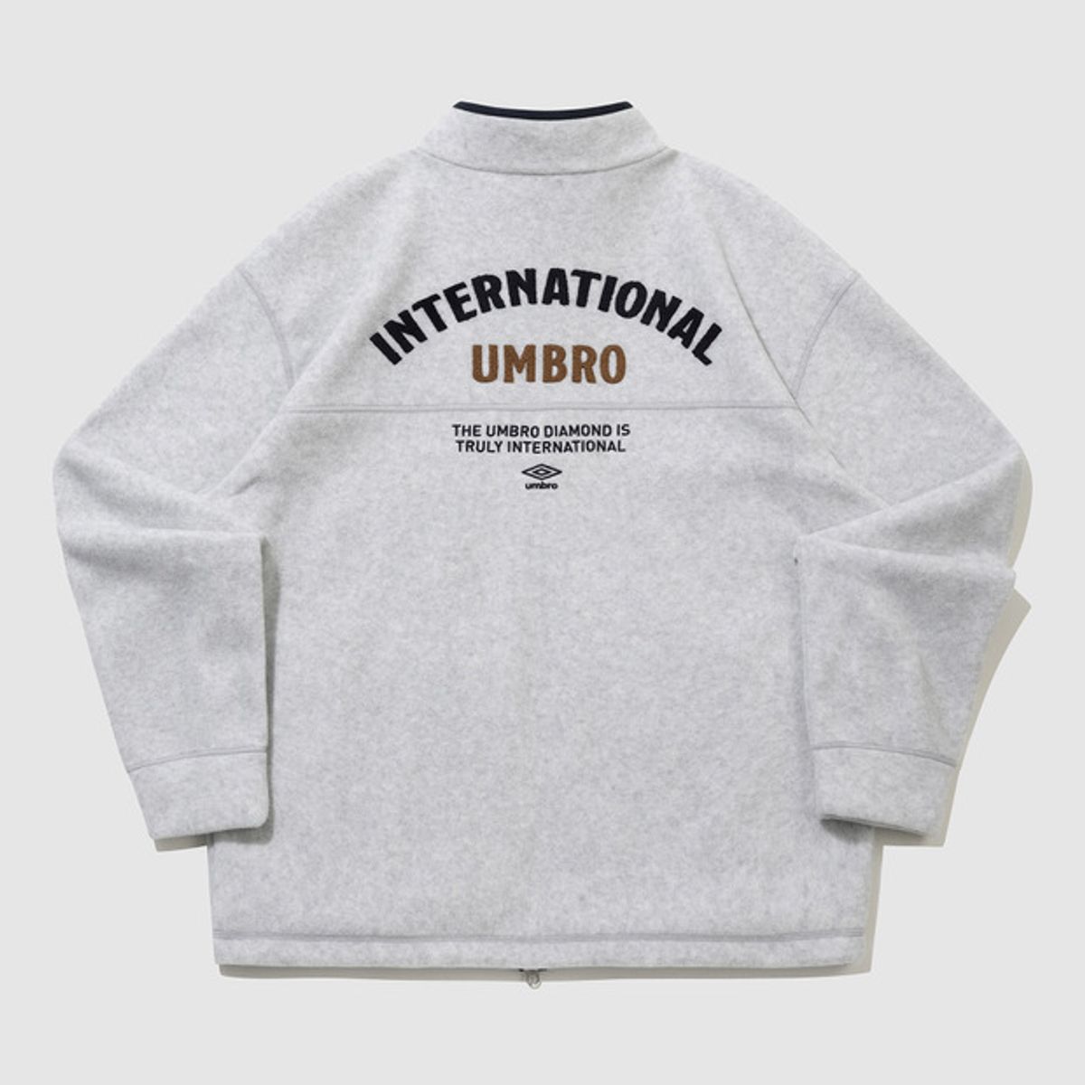 엄브로(UMBRO) 플러스플리스 스탠넥 집업 자켓 라이트 그레이 UQ421CFTN1