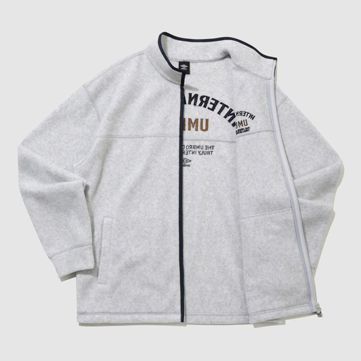 엄브로(UMBRO) 플러스플리스 스탠넥 집업 자켓 라이트 그레이 UQ421CFTN1