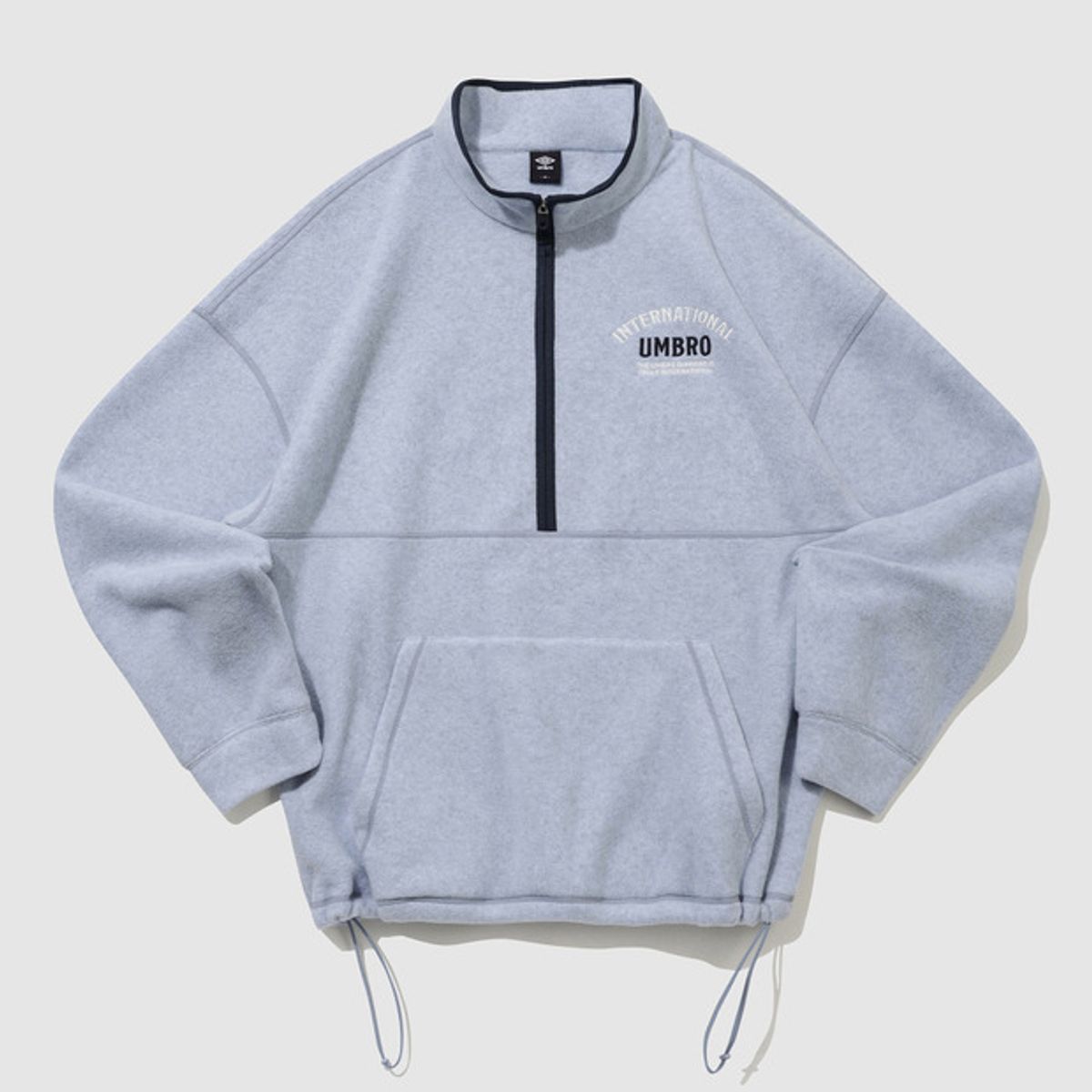 엄브로(UMBRO) 플러스플리스 레터링 하프집업 스카이블루 UQ423CFSN1