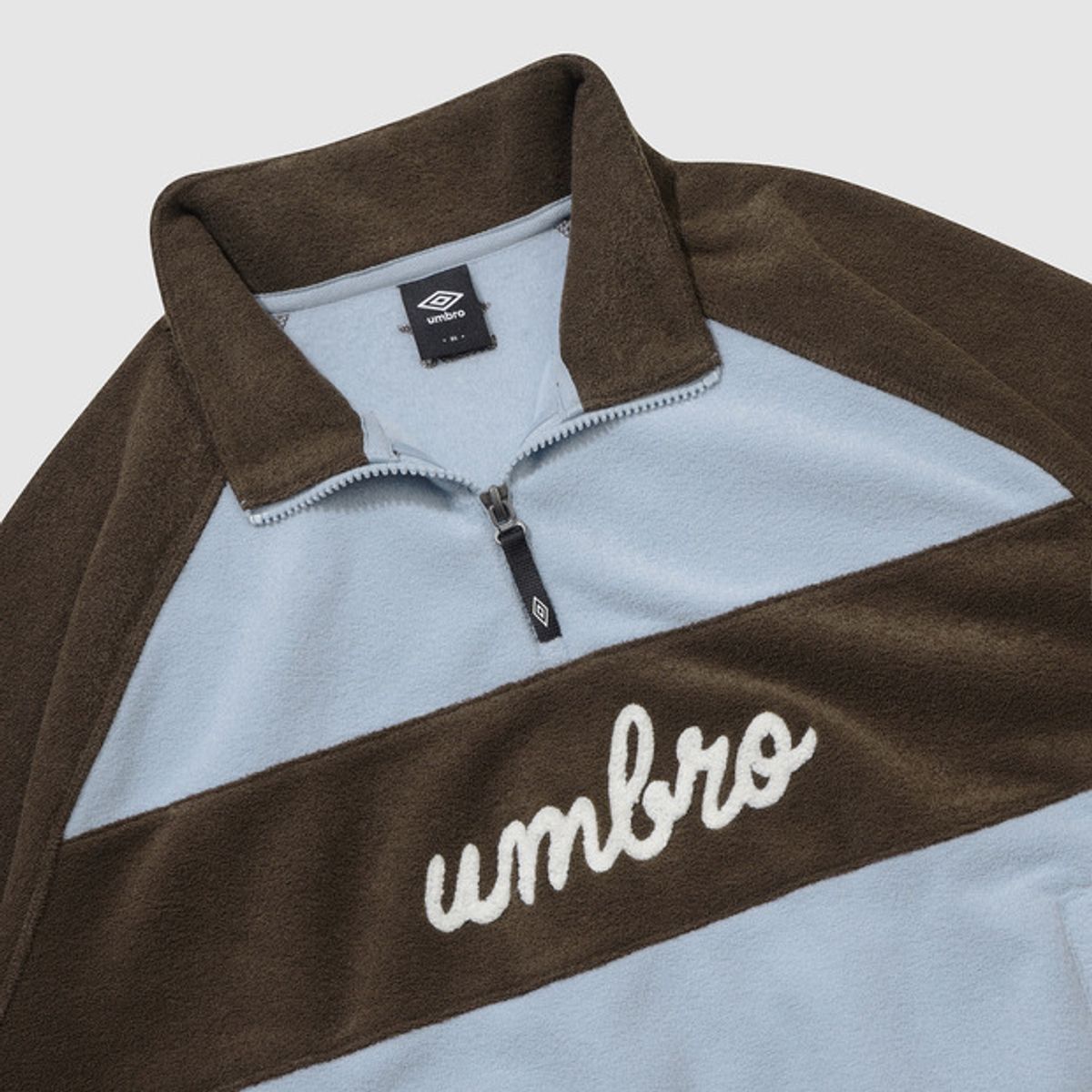 엄브로(UMBRO) 우먼스 플러피 스탠넥 하프집업 맨투맨 블루 UQ422CFSN1