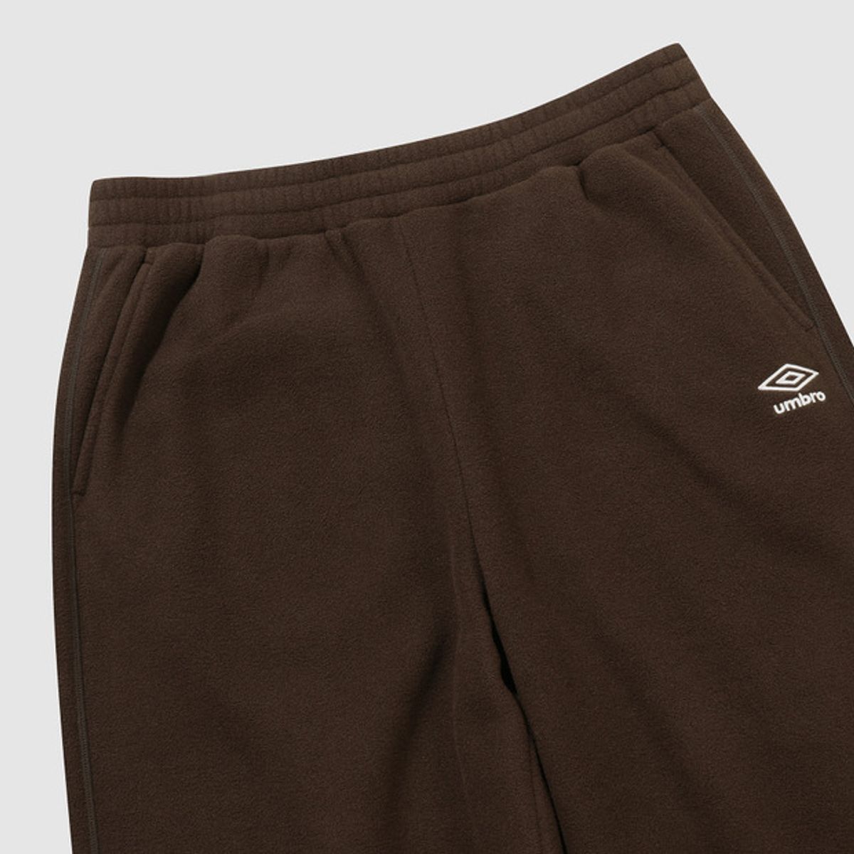 엄브로(UMBRO) 플러스플리스 2WAY 스트레이트 팬츠 브라운 UQ423CFPN1