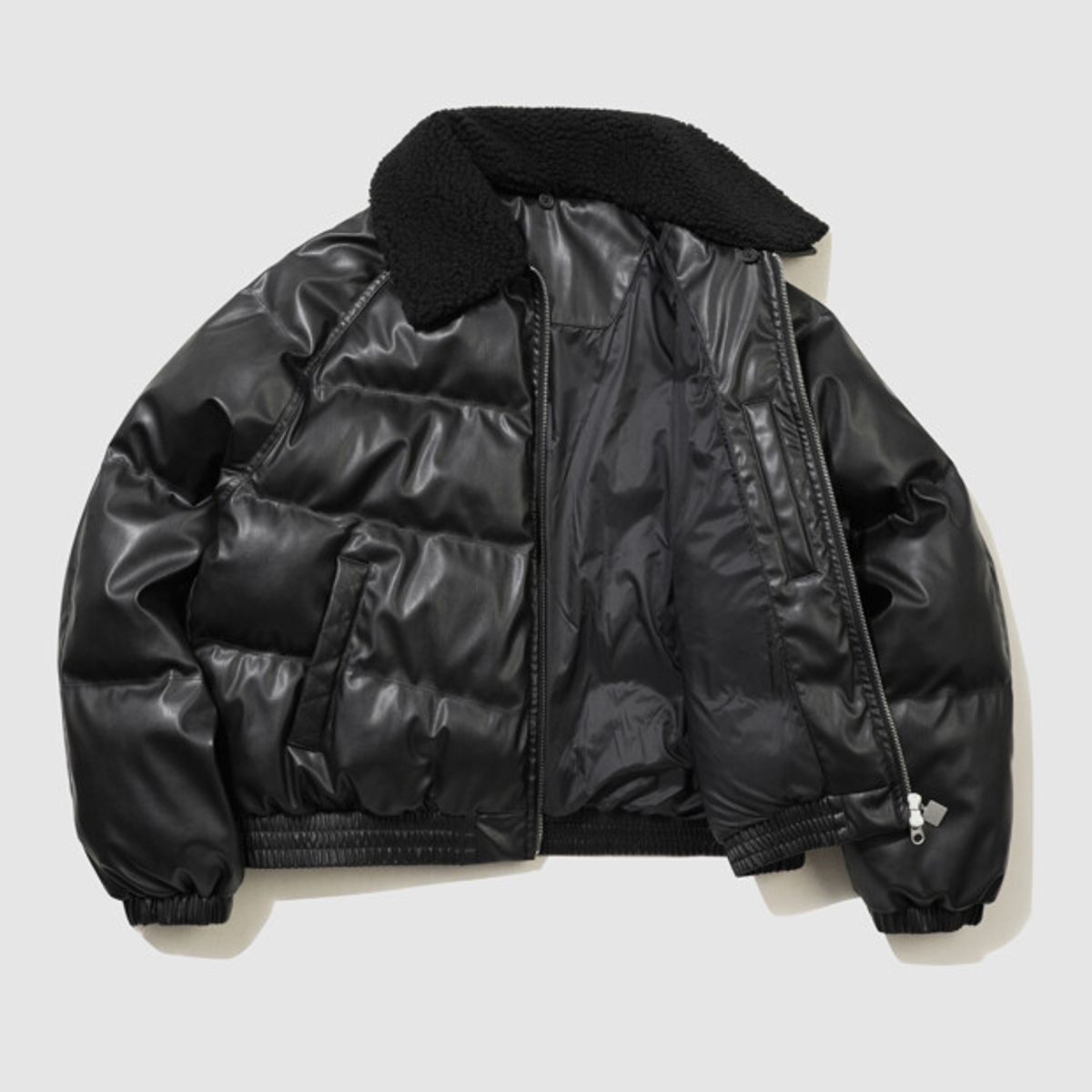 엄브로(UMBRO) 윈터 헤븐 레더라이크 카라형 패딩 자켓 블랙 UQ423CPJN1