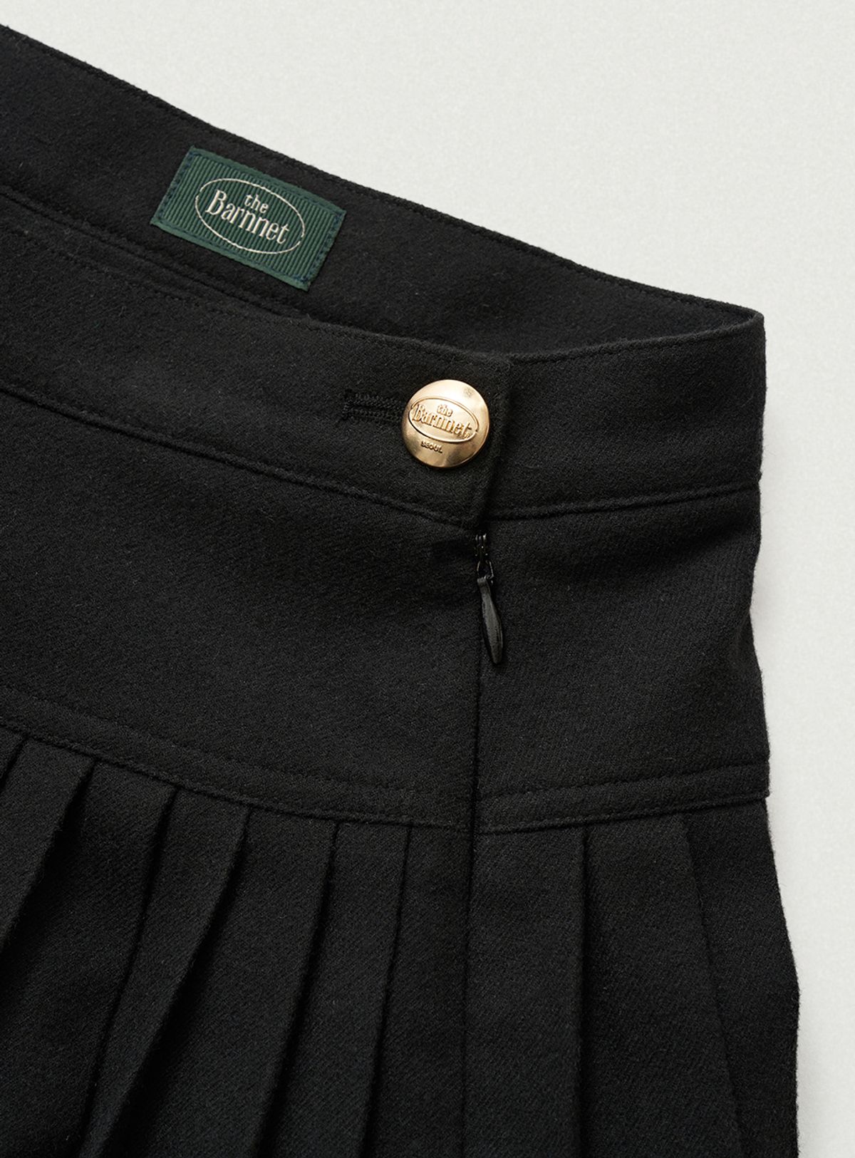 더바넷(THEBARNNET) Karelian Pleats Mini Skirt_Black