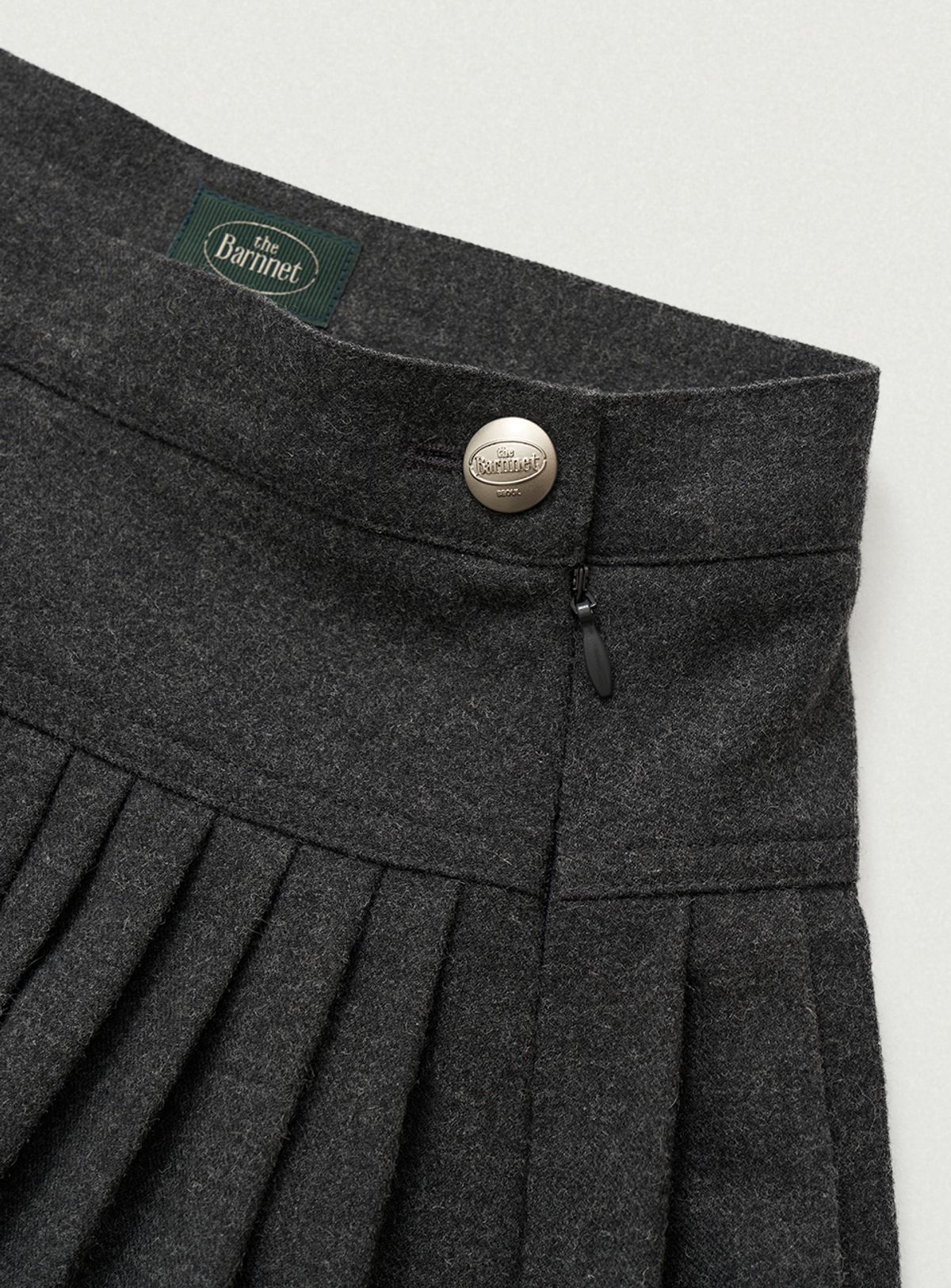 더바넷(THEBARNNET) Karelian Pleats Mini Skirt_Charcoal