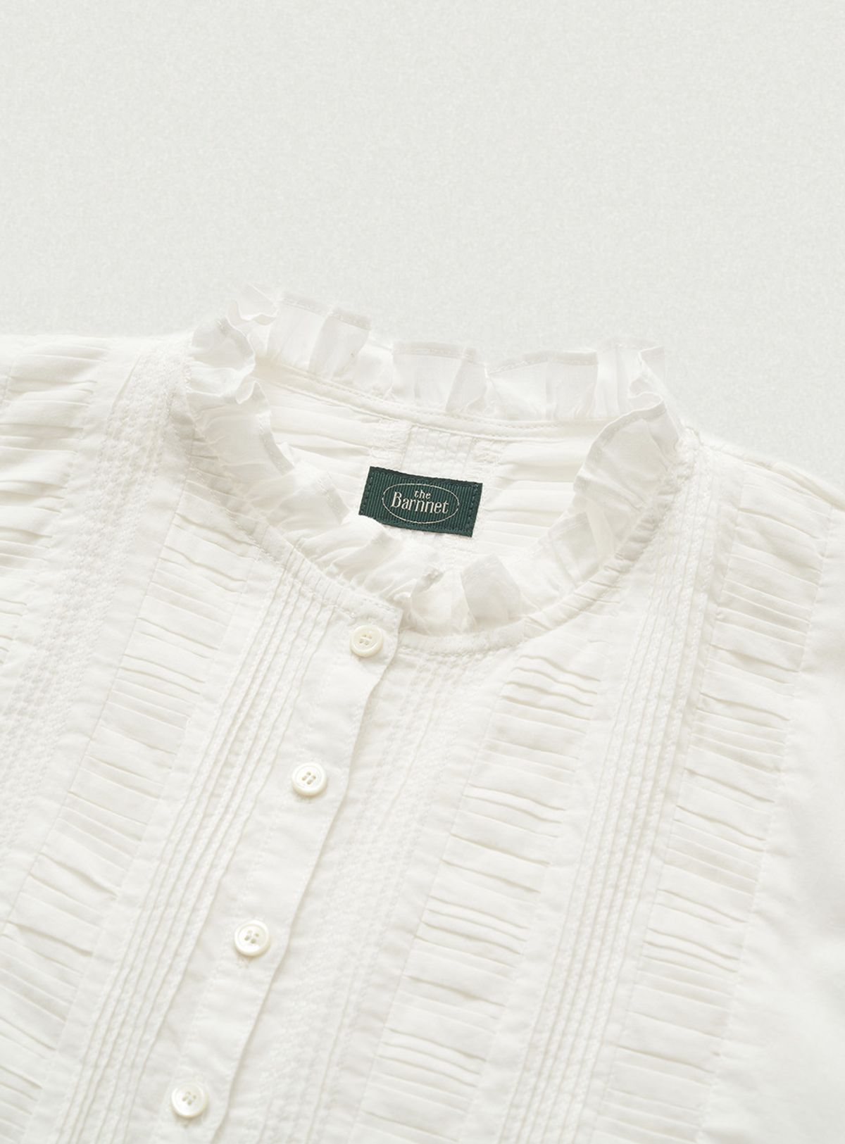 더바넷(THEBARNNET) Plene Pintuck blouse_Ivory