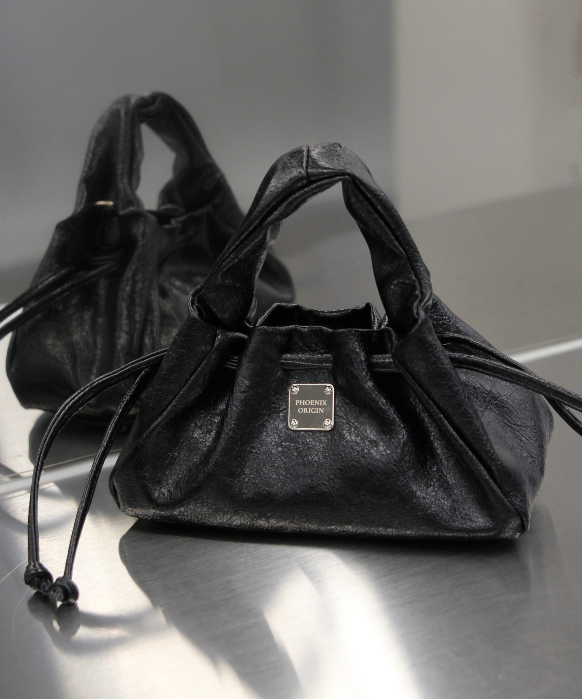 피닉스오리진(PHOENIX ORIGIN) Mini Dumpling Bag - Black
