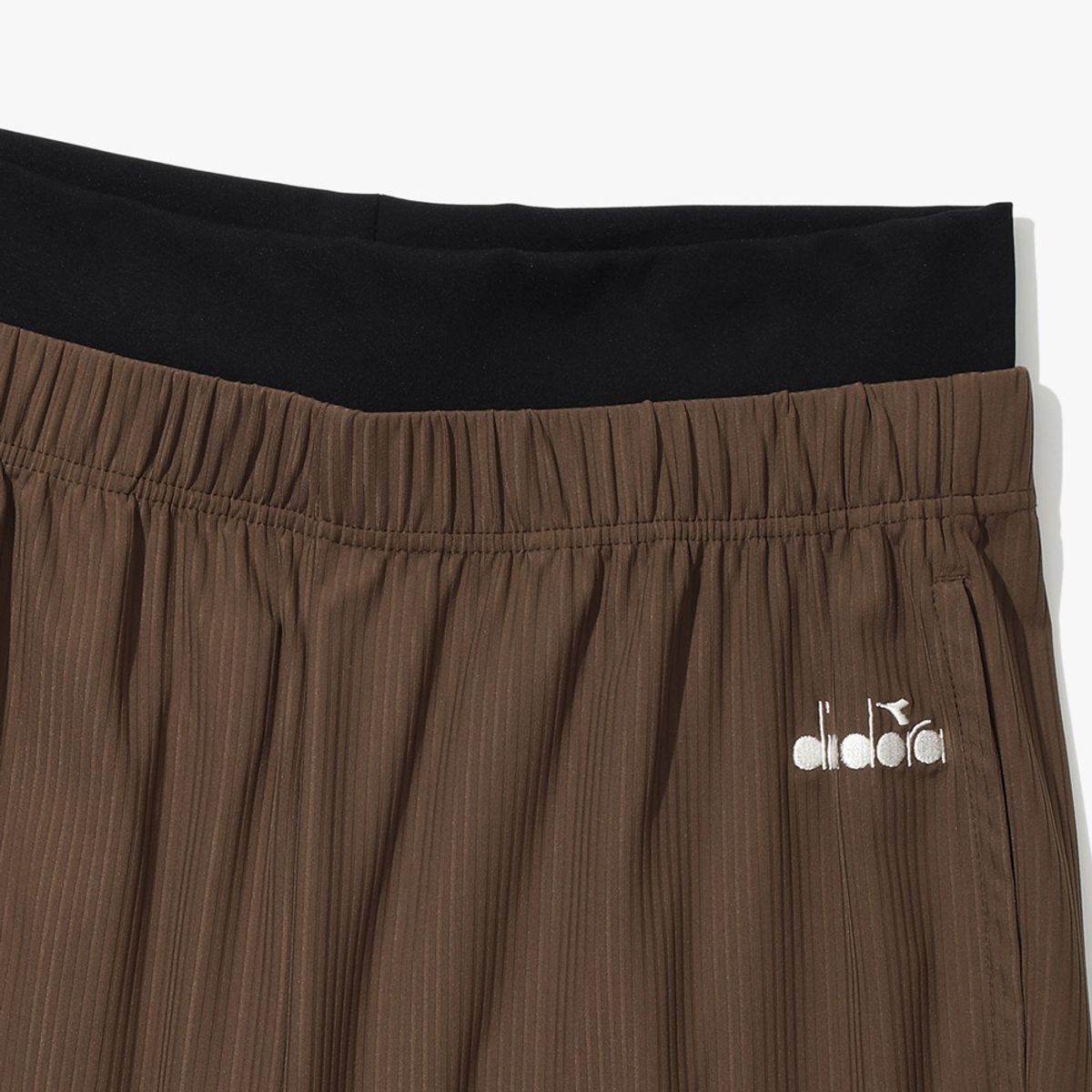 디아도라(diadora) 크로스코트 퍼포먼스 골지 팬츠 BROWN
