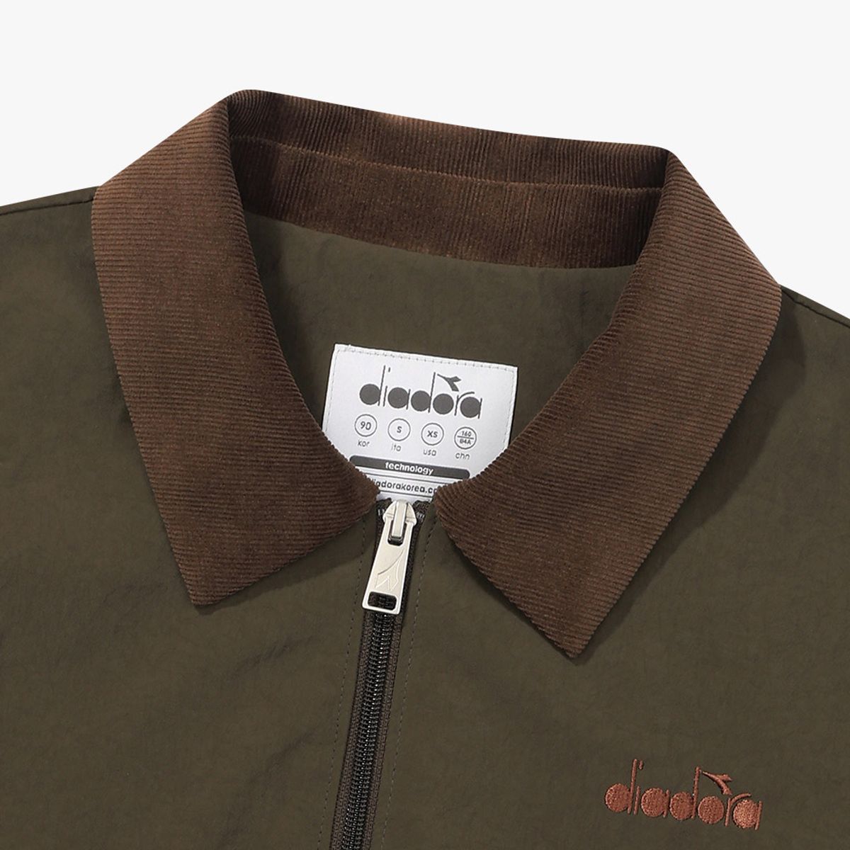 디아도라(diadora) 크로스코트 코치 자켓 우먼 KHAKI