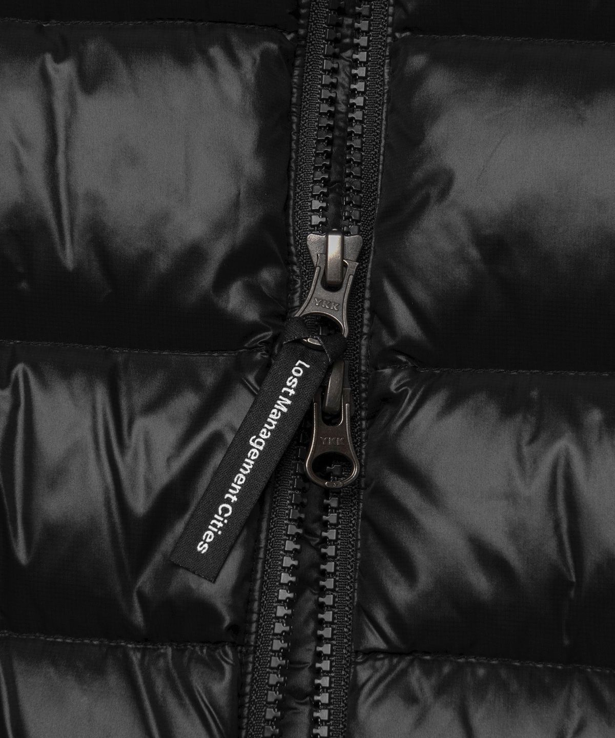 엘엠씨(LMC) OVAL GLOBE LIGHT WEIGHT HOODED DOWN JACKET black