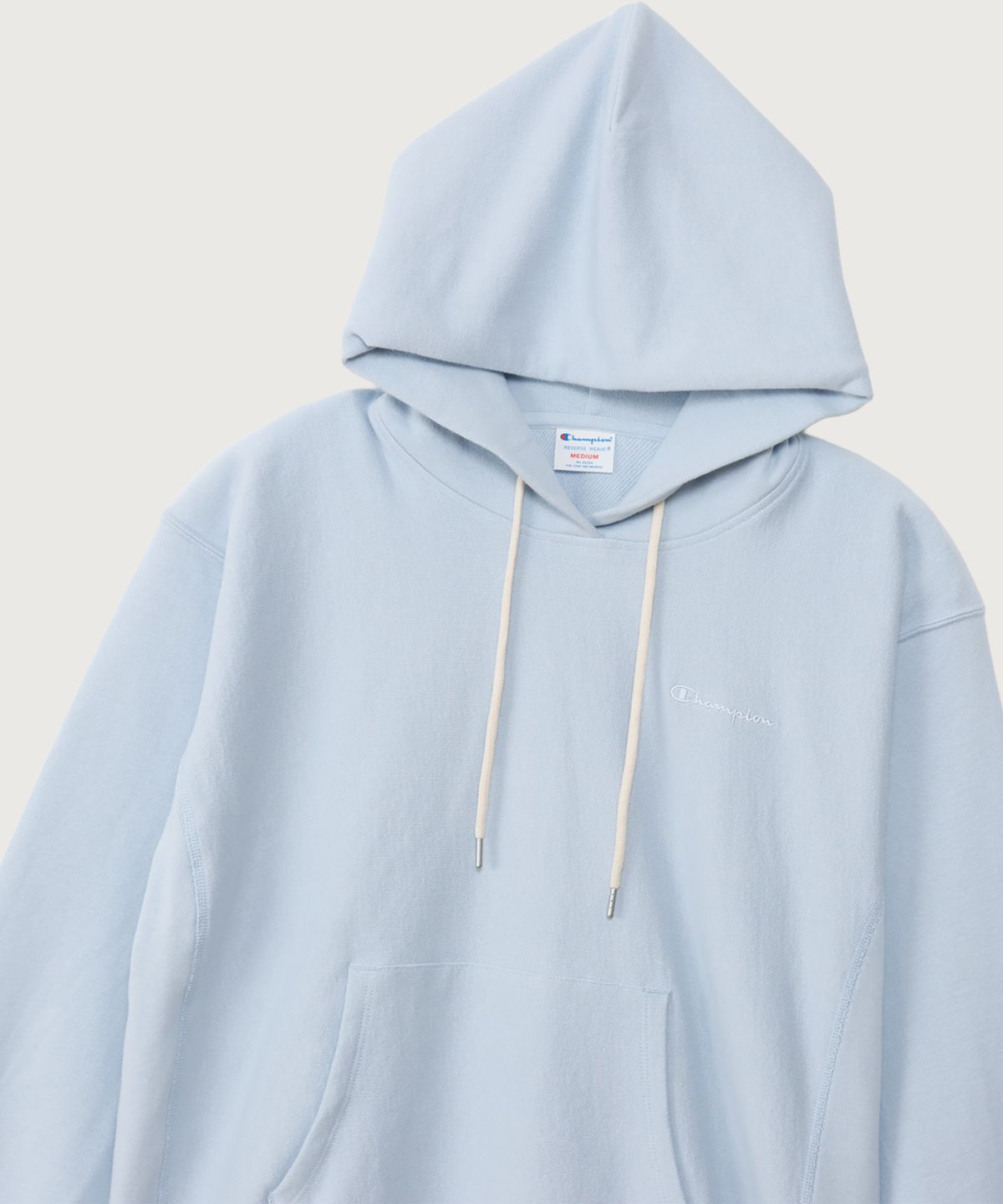 챔피온(CHAMPION) 여성 리버스위브 스몰 로고 루즈핏 후드 티셔츠 Light Blue