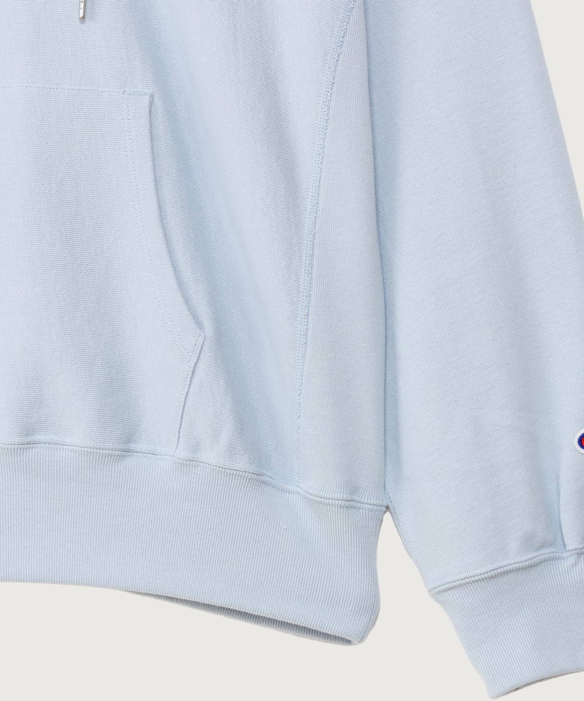 챔피온(CHAMPION) 여성 리버스위브 스몰 로고 루즈핏 후드 티셔츠 Light Blue