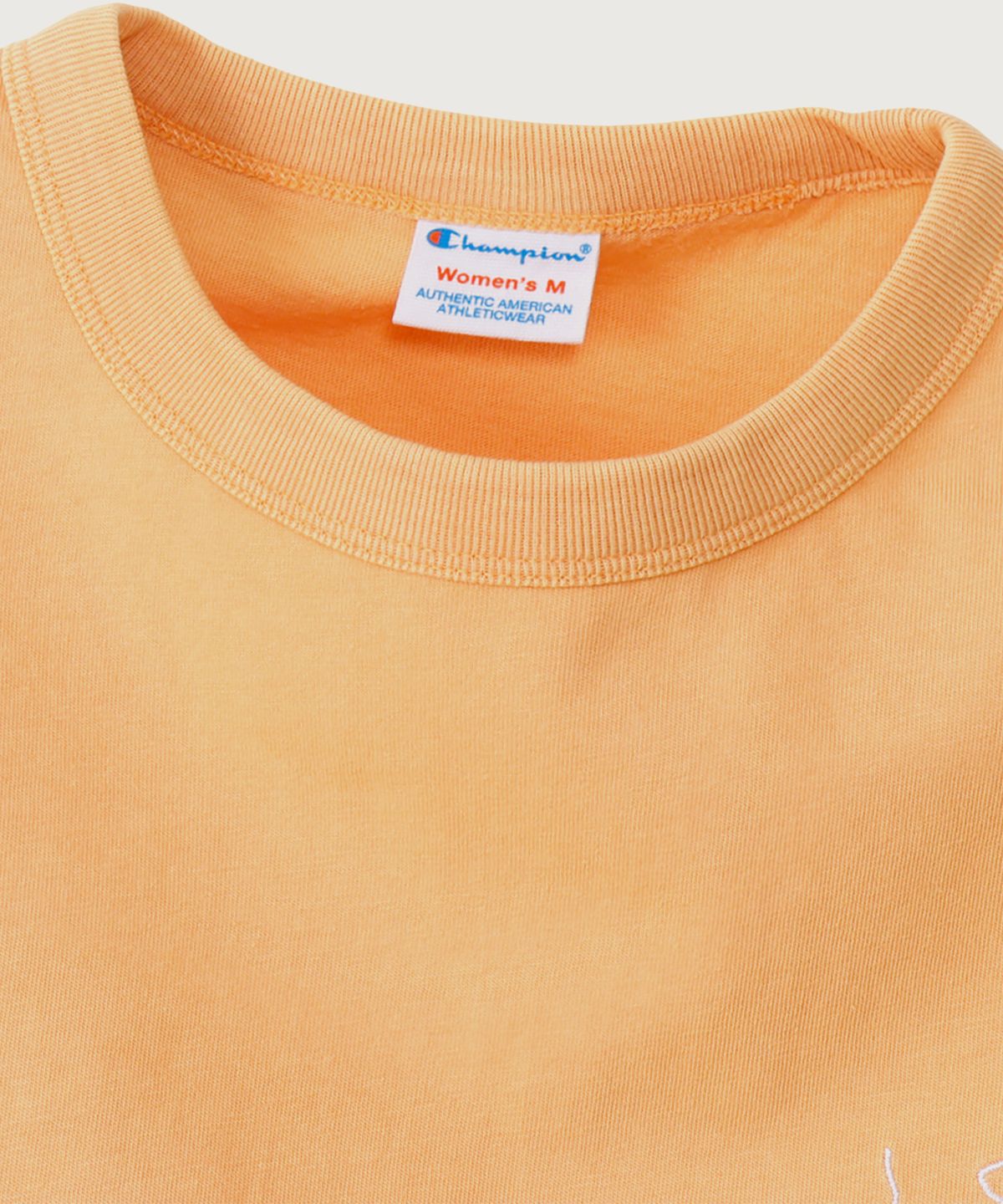 챔피온(CHAMPION) 여성 아치 로고 루즈핏 워싱 롱슬리브 Soft Orange