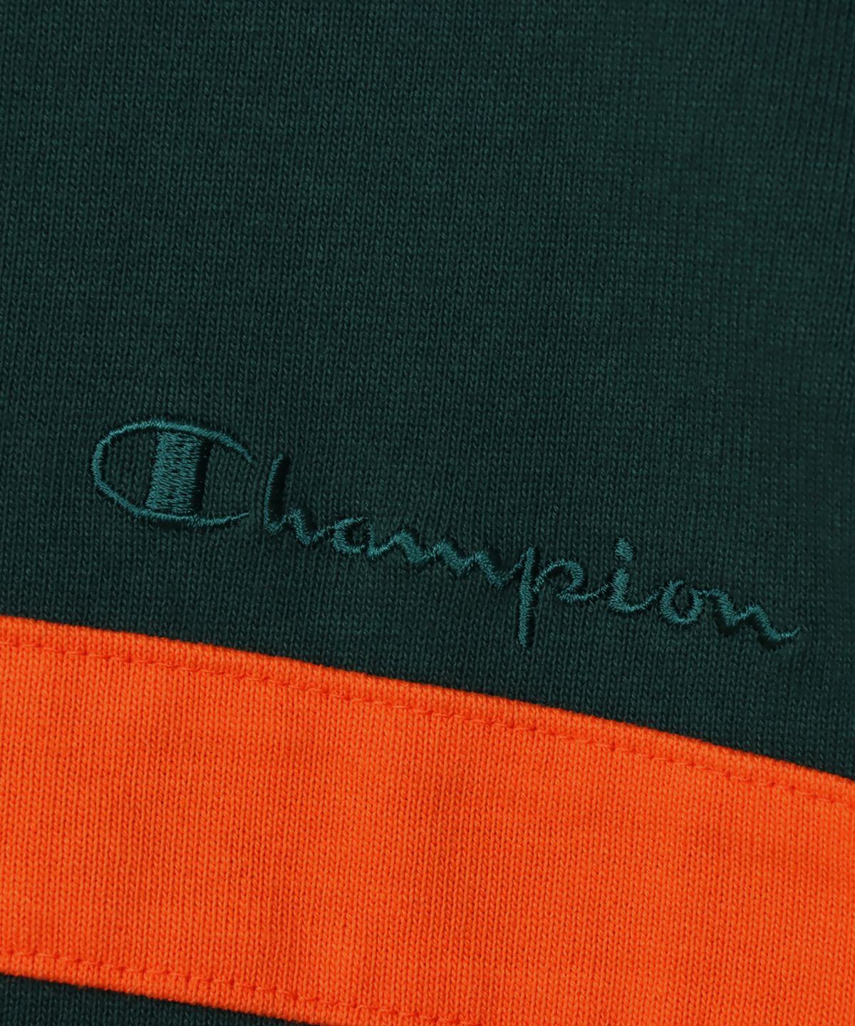 챔피온(CHAMPION) 하프 스냅 오버핏 조그택 롱슬리브 티셔츠 Dark Green
