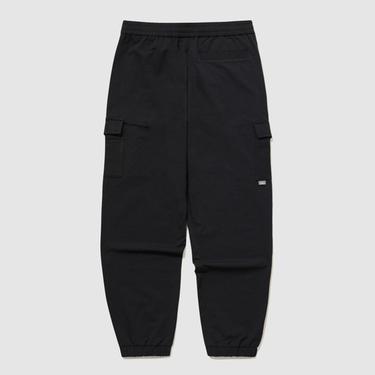 엄브로(UMBRO) 폴라 스트레치 기모 카고 조거 팬츠 블랙 UQ423SPTO1