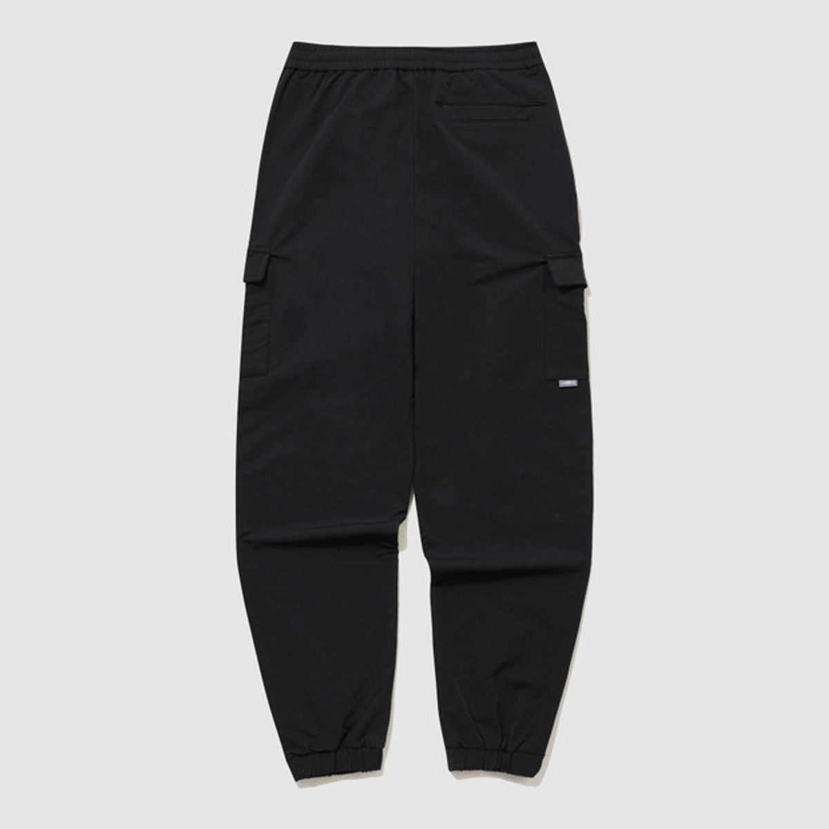 엄브로(UMBRO) 폴라 스트레치 기모 카고 조거 팬츠 블랙 UQ423SPTO1