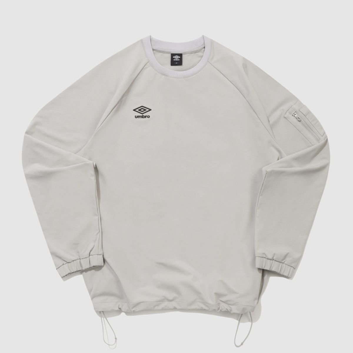 엄브로(UMBRO) 폴라 스트레치 기모 포켓 피스테 베이지 UQ421SWTO2