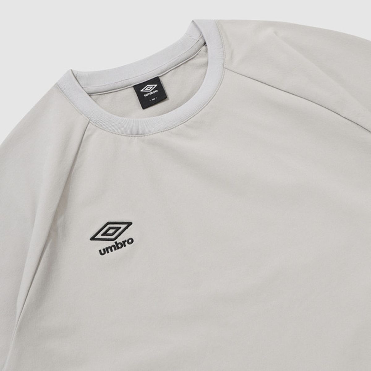 엄브로(UMBRO) 폴라 스트레치 기모 포켓 피스테 베이지 UQ421SWTO2