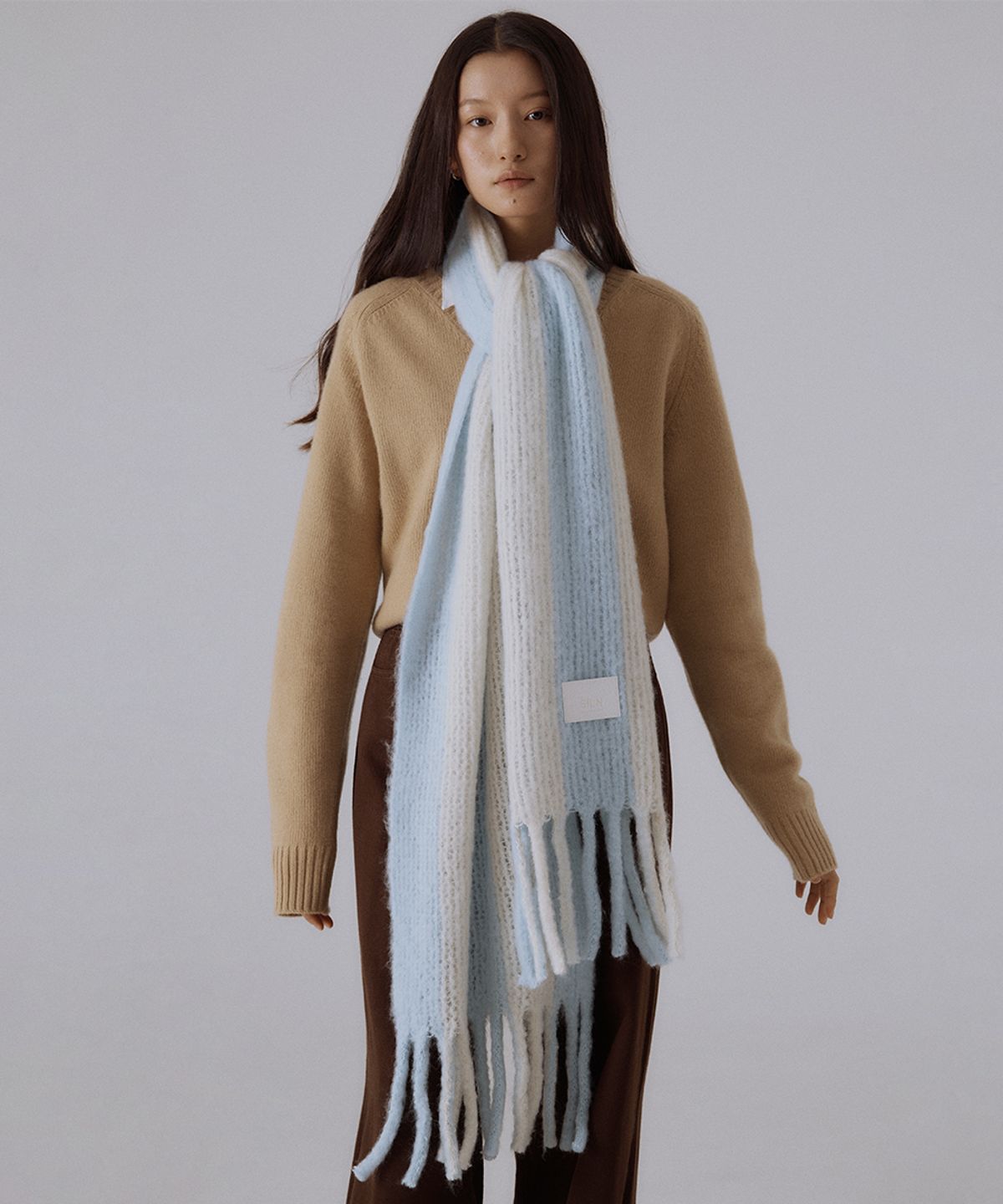 실른(SILN) Serra wide stripe knit muffler (BABY BLUE/IVORY)