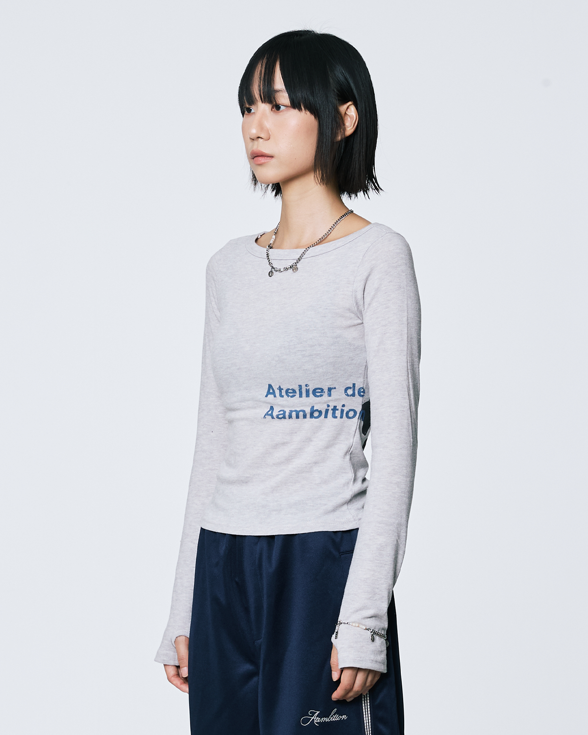 어앰비션(AAMBITION) 아뜰리에 크로스 롱슬리브 (메란지)