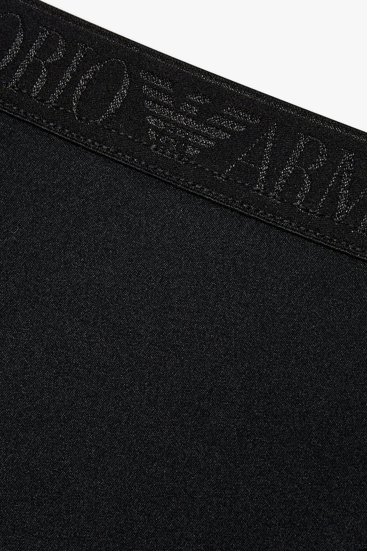 엠포리오 아르마니 언더웨어(EMPORIO ARMANI UNDERWEAR) 여성 샤이닝 로고 밴딩 티팬티_블랙 0825310511
