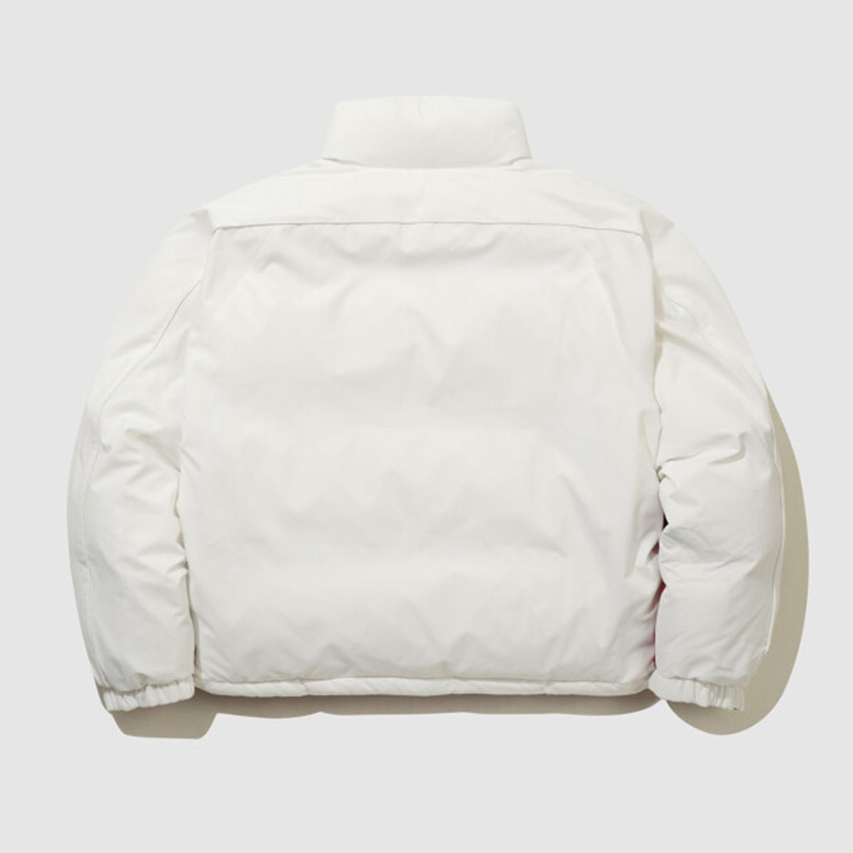엄브로(UMBRO) 시그니쳐 리버서블 머스코비 덕 다운 자켓 아이보리 UQ421CDJD1