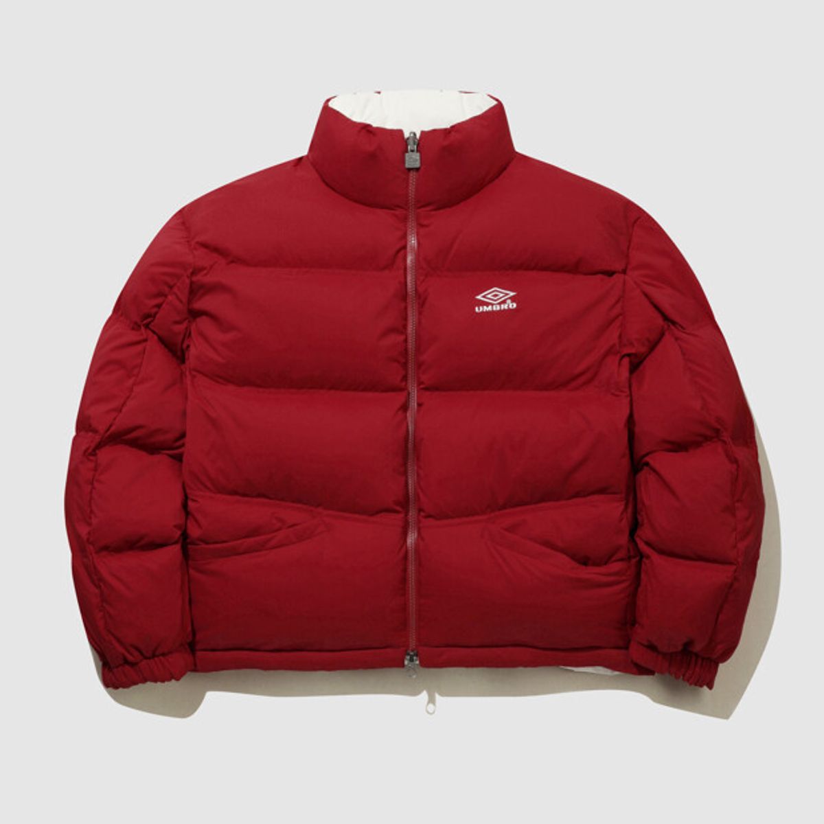 엄브로(UMBRO) 시그니쳐 리버서블 머스코비 덕 다운 자켓 아이보리 UQ421CDJD1