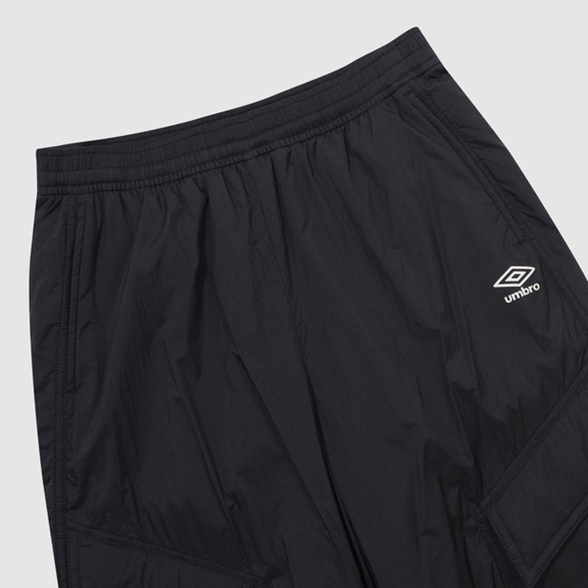 엄브로(UMBRO) 멜로우 와이드 & 조거 2WAY 패딩 팬츠 블랙 UQ423CPTO1