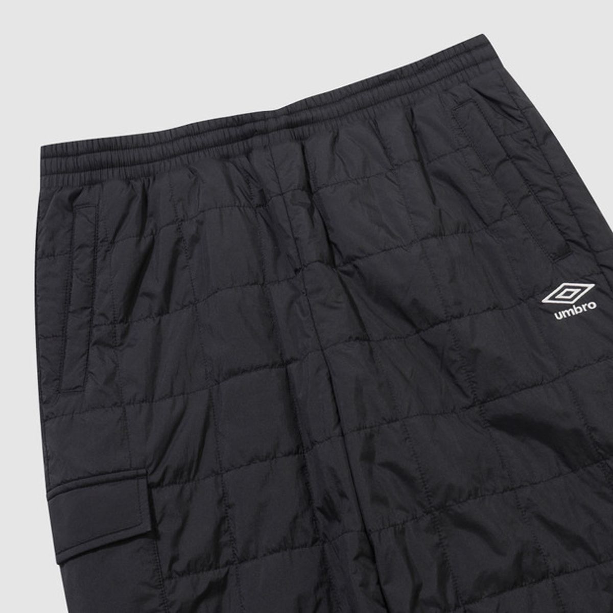 엄브로(UMBRO) 멜로우 퀼티드 패딩 팬츠 블랙 UQ423CPTO2