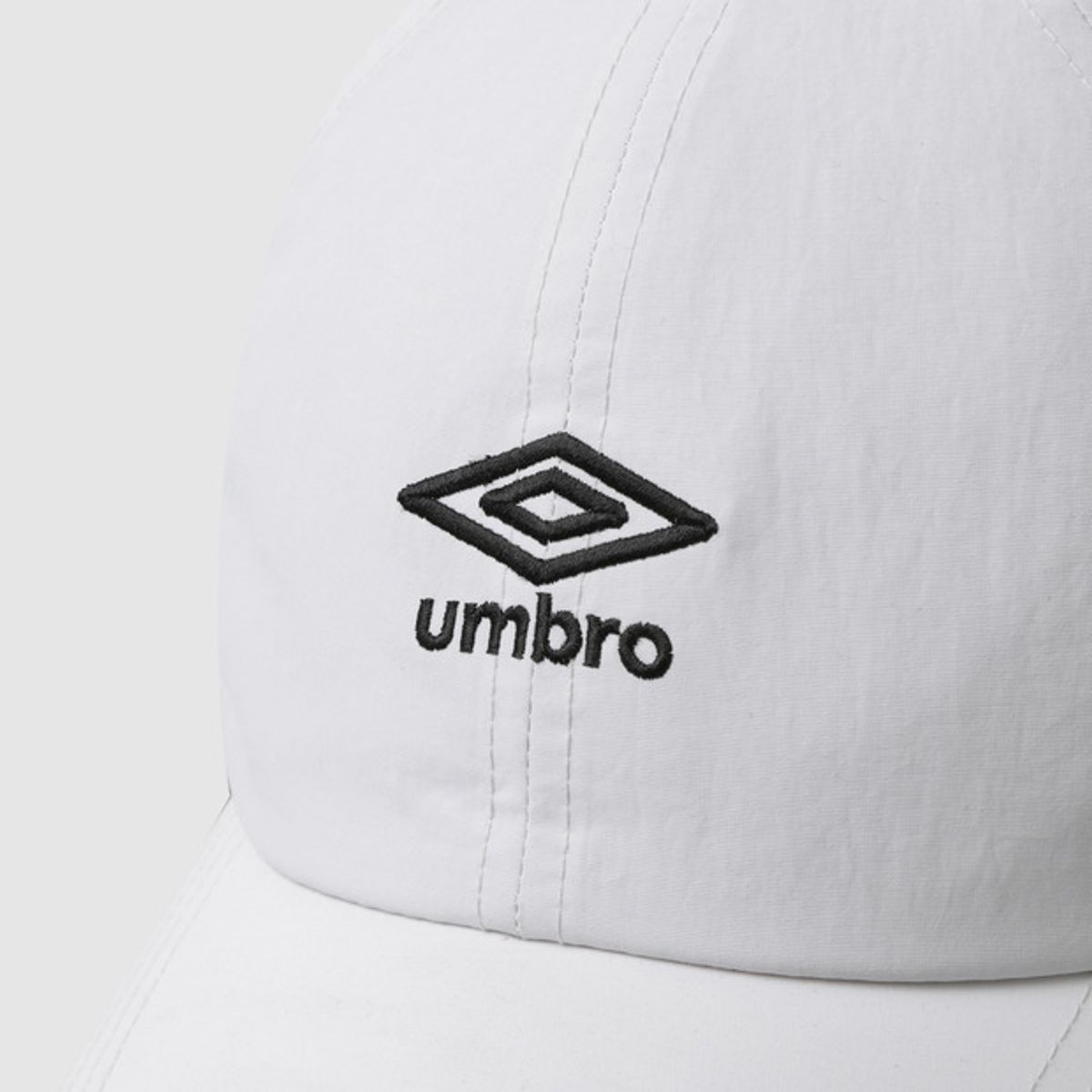 엄브로(UMBRO) 소프트 이어플랩 캡 화이트 UQ423CCPO2
