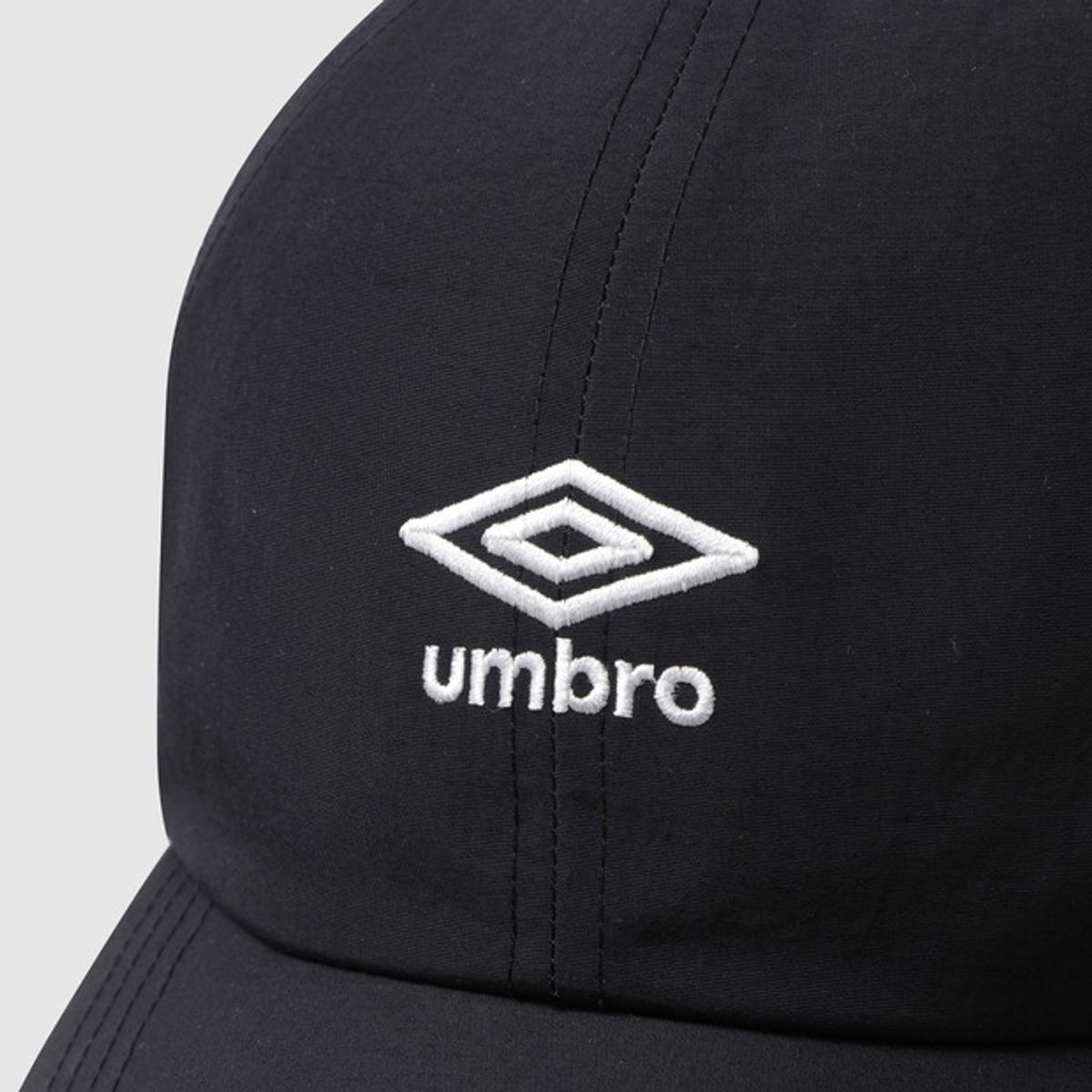 엄브로(UMBRO) 소프트 이어플랩 캡 블랙 UQ423CCPO2