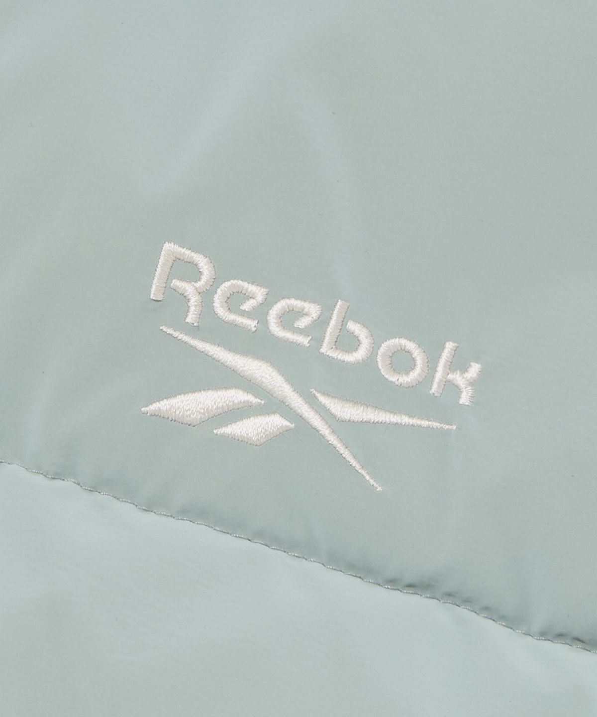 리복(REEBOK) 소프트 크롭 후드 볼패딩 (W) - 민트