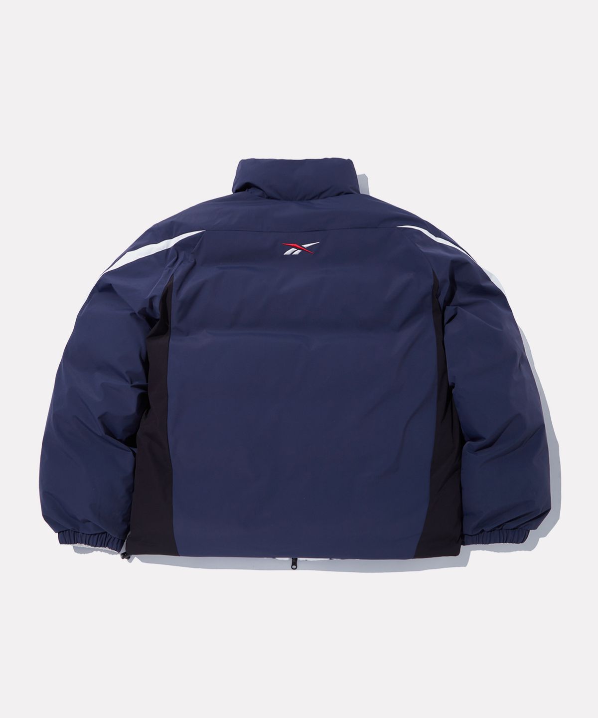 리복(REEBOK) 벡터 리버시블 볼패딩 - 네이비:화이트