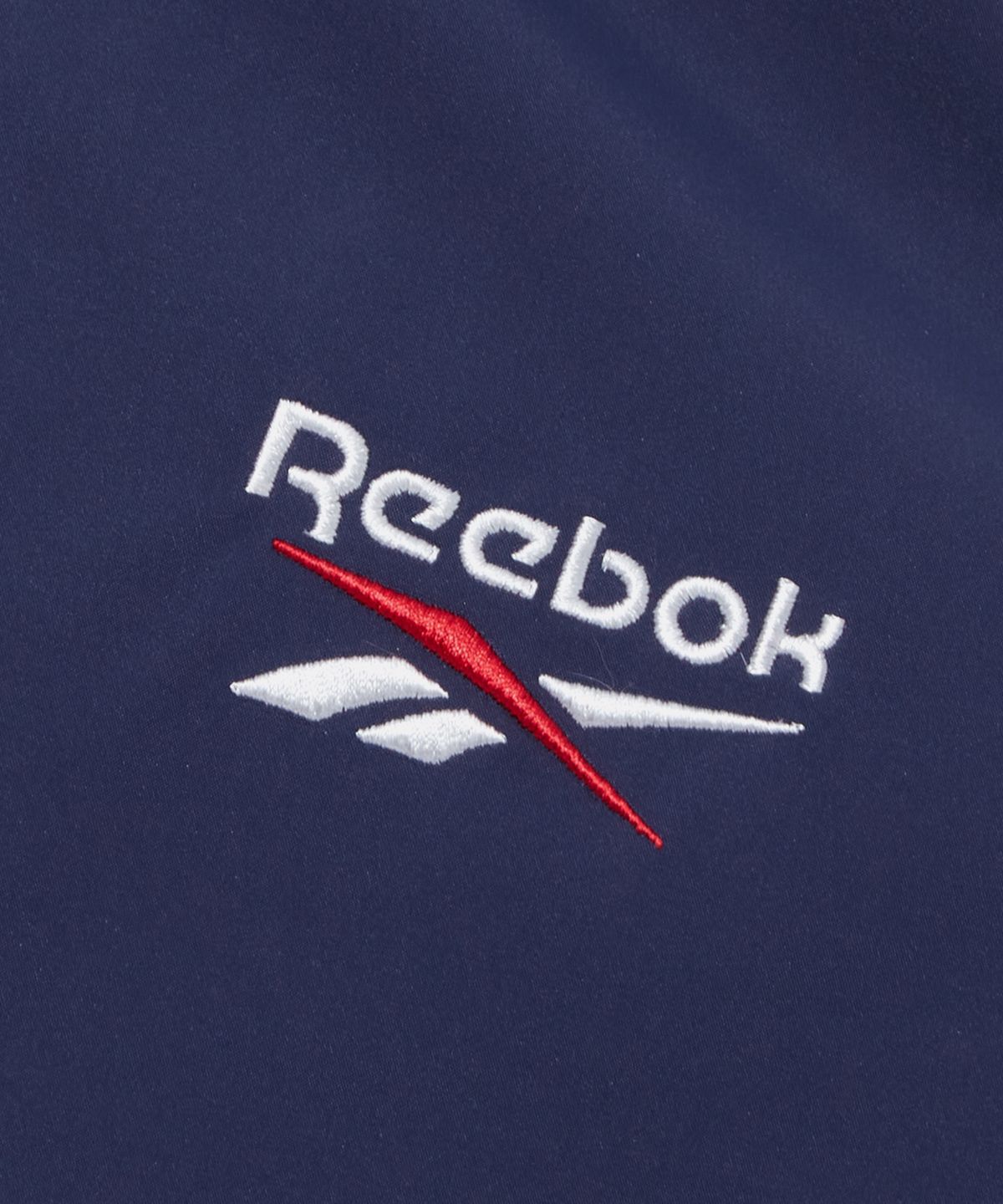 리복(REEBOK) 벡터 리버시블 볼패딩 - 네이비:화이트