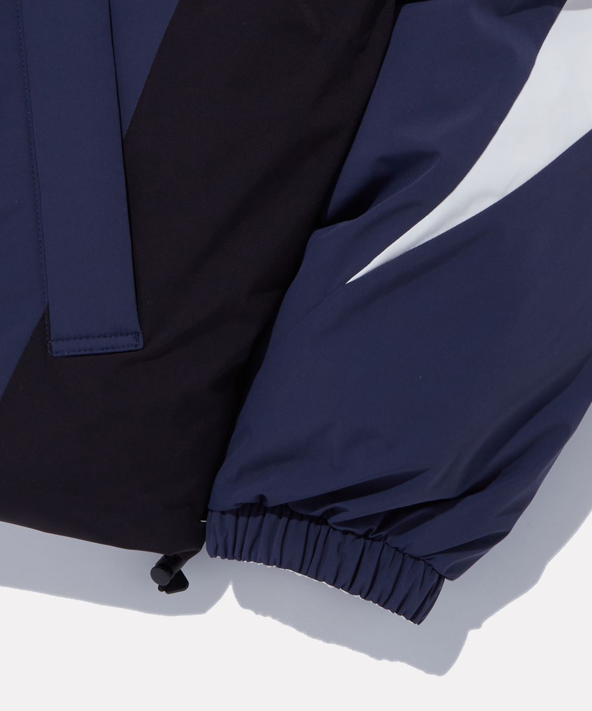 리복(REEBOK) 벡터 리버시블 볼패딩 - 네이비:화이트