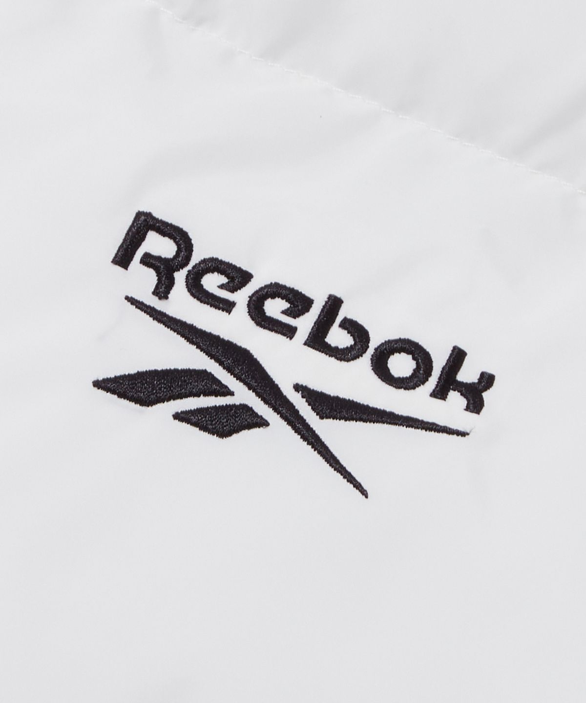 리복(REEBOK) 벡터 리버시블 볼패딩 - 네이비:화이트