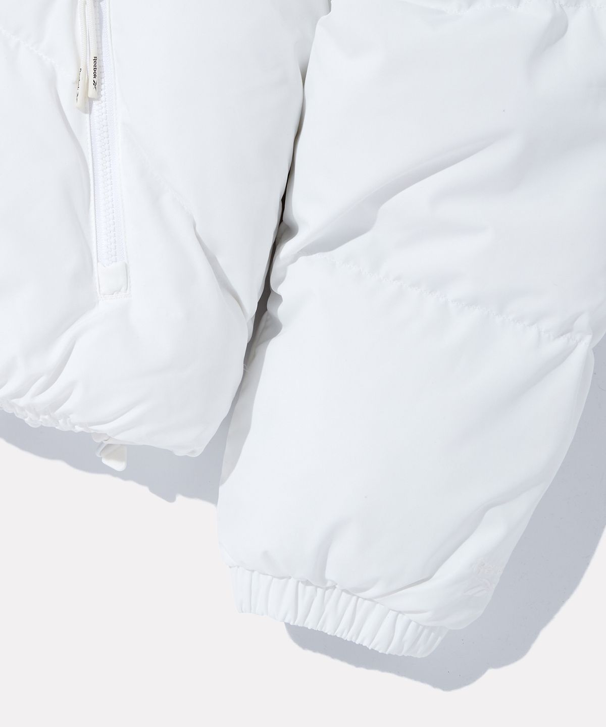 리복(REEBOK) 프리미어 크롭 볼패딩 (W) - 오프 화이트