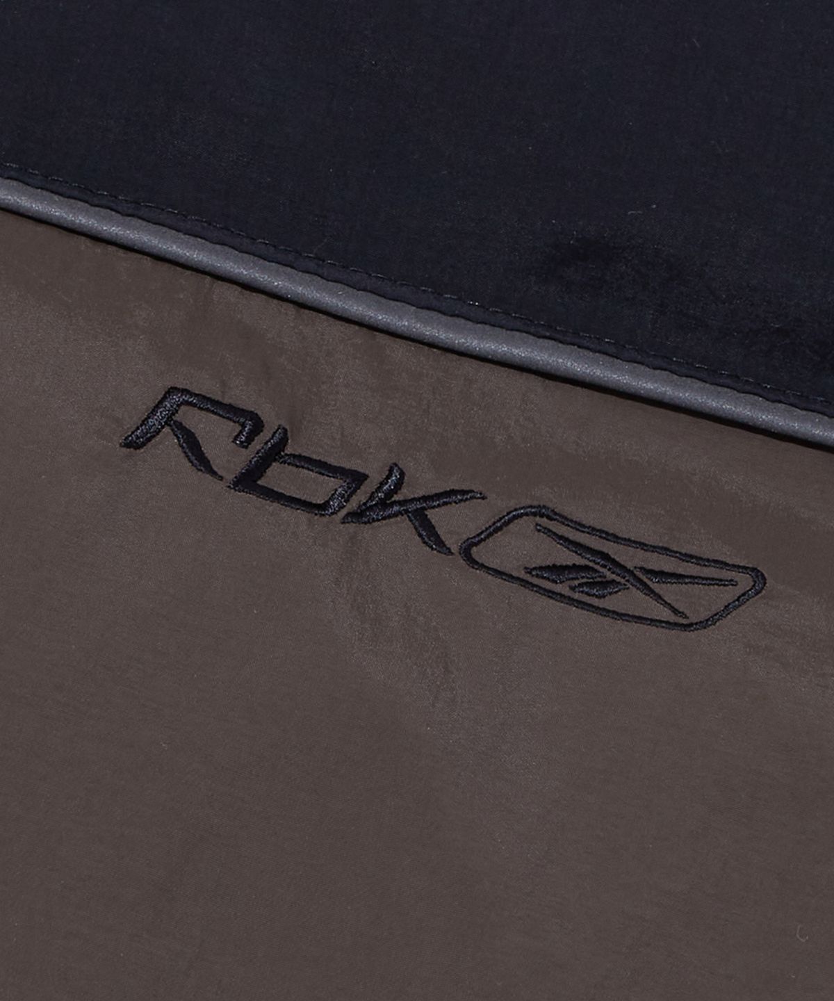 리복(REEBOK) 프리미어 후드 볼패딩 - 브라운