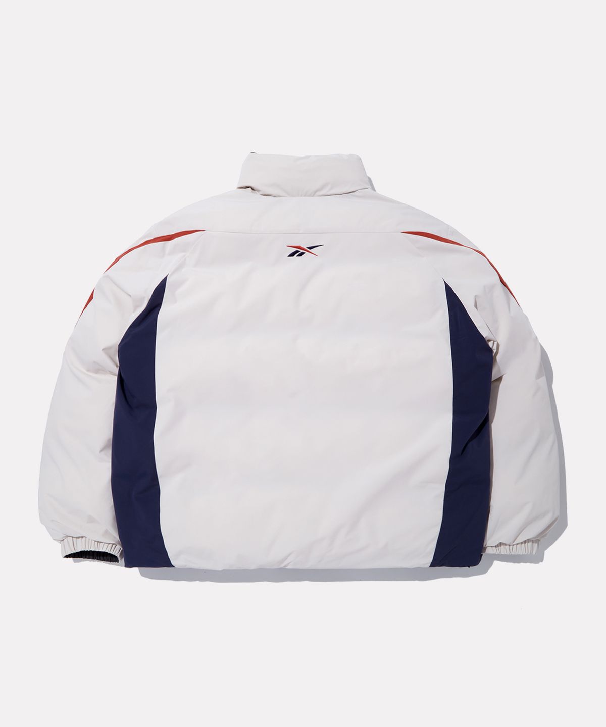 리복(REEBOK) 벡터 리버시블 볼패딩 - 페일베이지:차콜