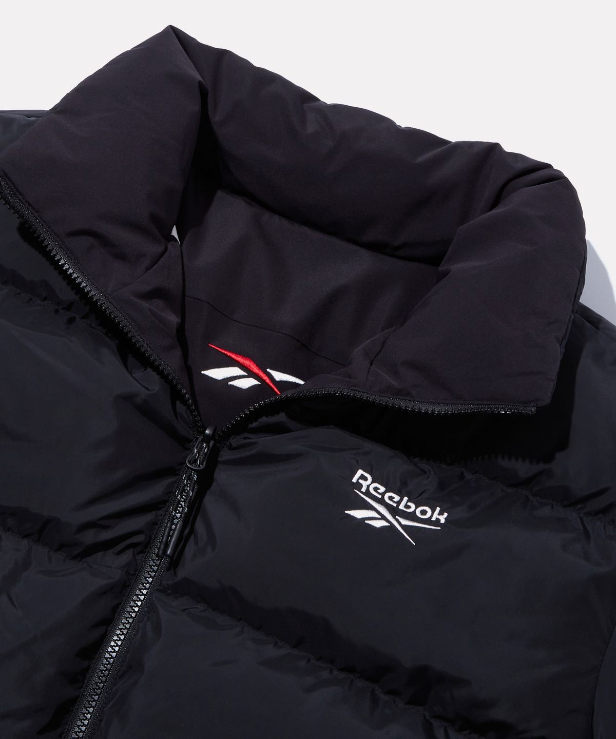 리복(REEBOK) 벡터 리버시블 볼패딩 - 블랙:블랙