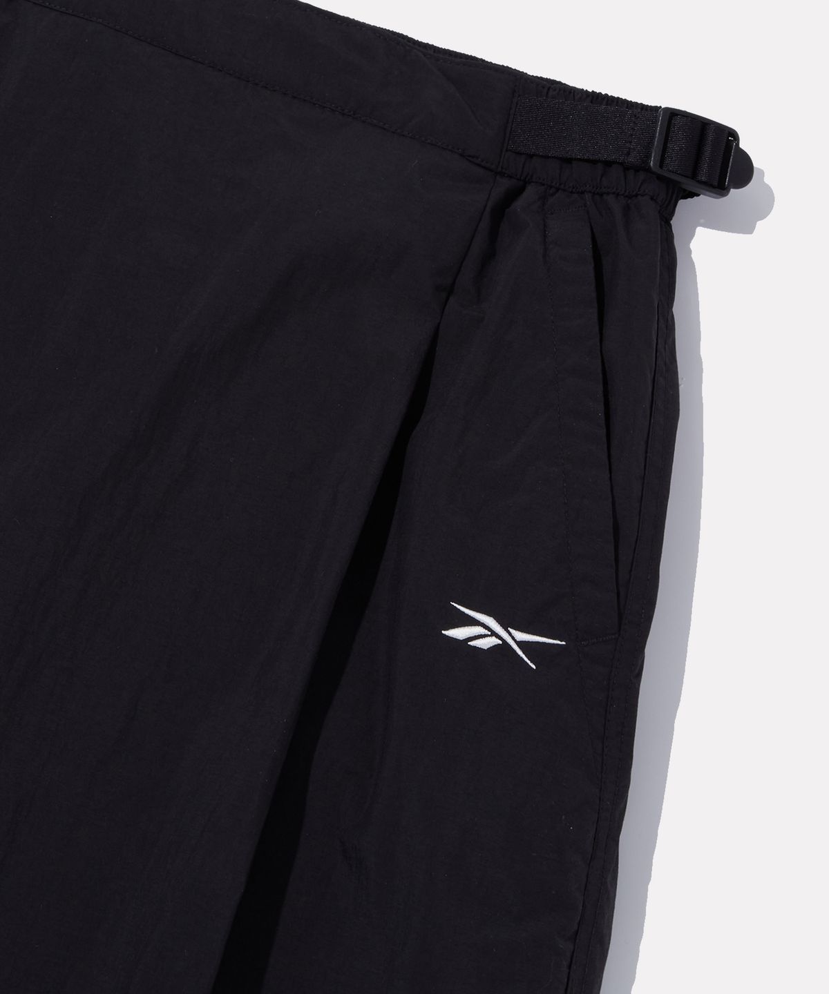 리복(REEBOK) 패딩 스커트 (W) - 블랙