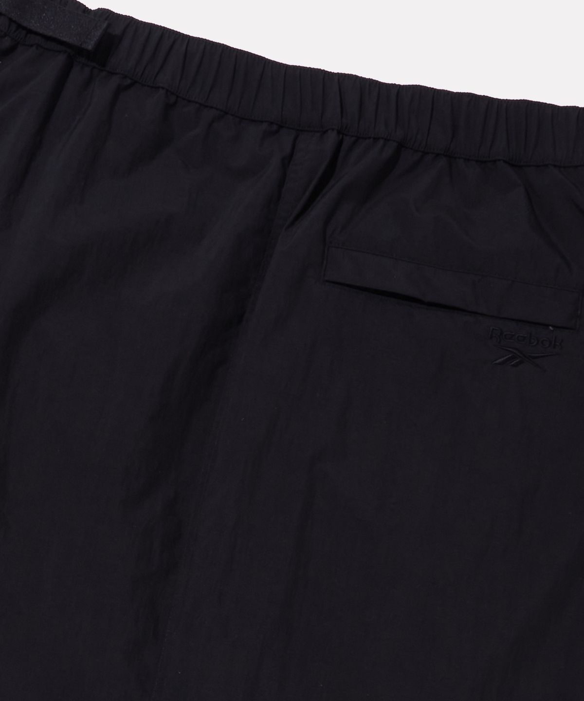 리복(REEBOK) 패딩 스커트 (W) - 블랙