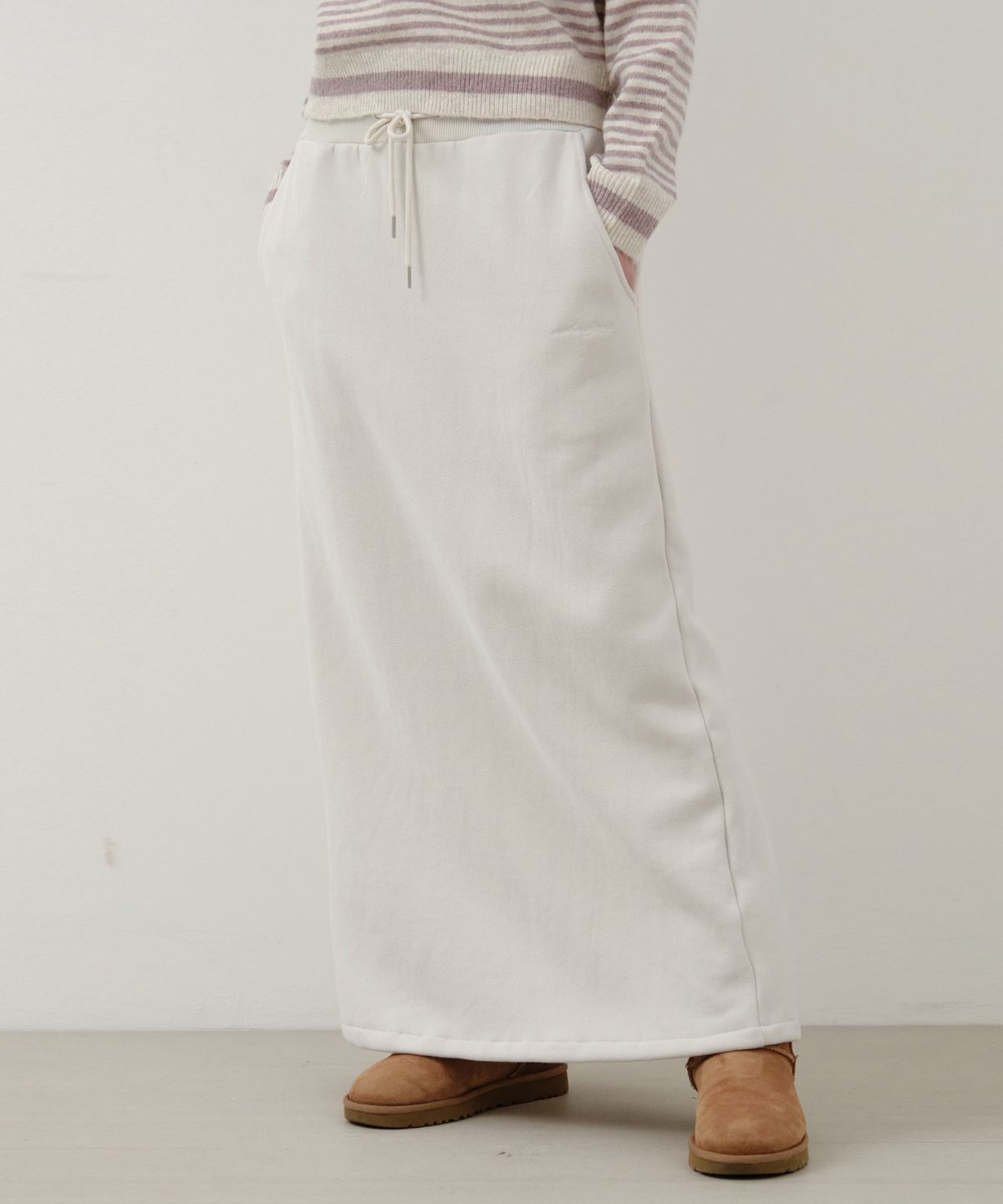 웬즈데이오아시스 포 우먼(WEDNESDAYOASISFORWOMEN) 웜업 베이직 기모 롱스커트_LIGHT BEIGE(W25-SK04)