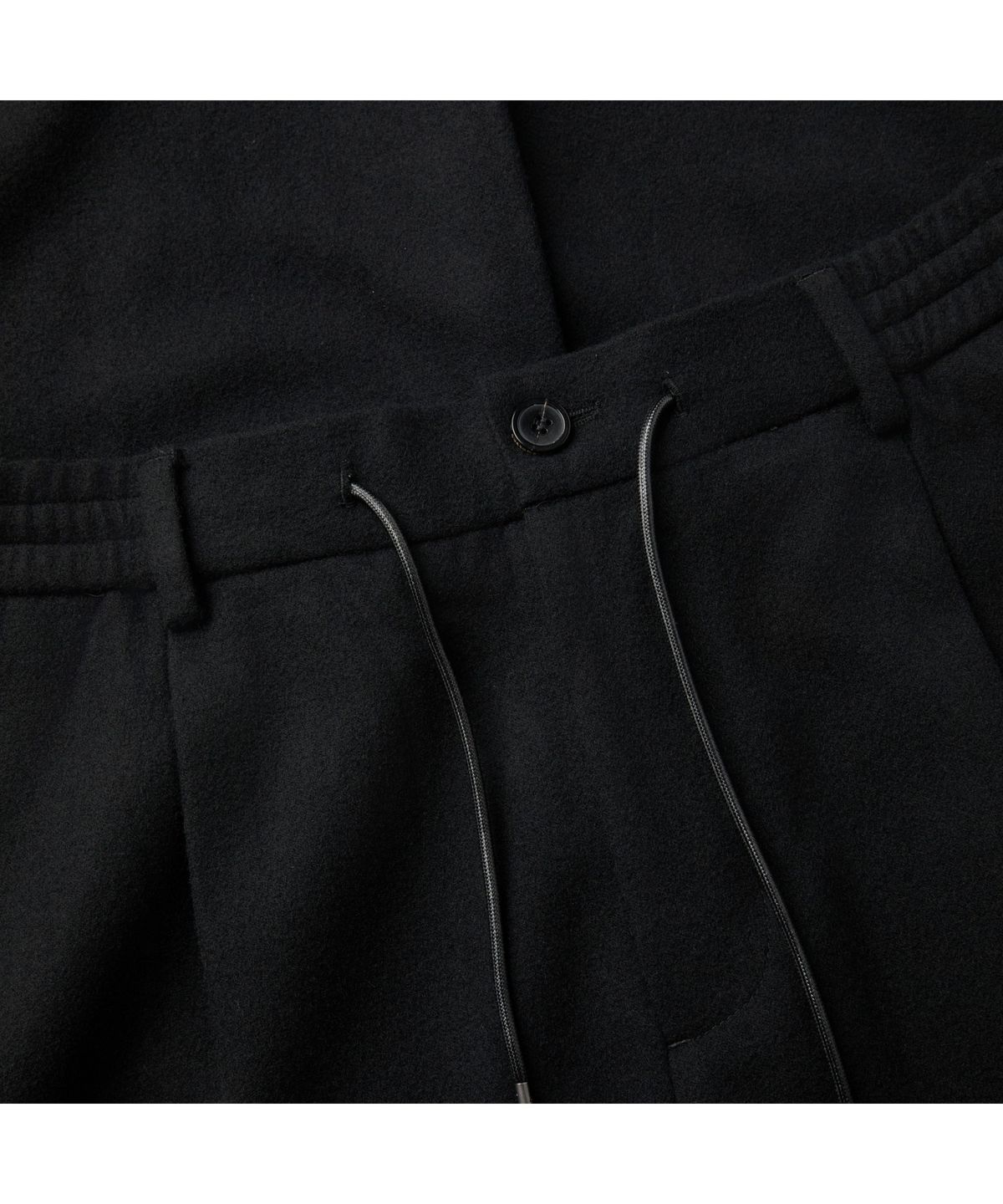 커스텀멜로우(CUSTOMELLOW) Black Wide Fit Tuck Wool Pants CWPAW25844BKX