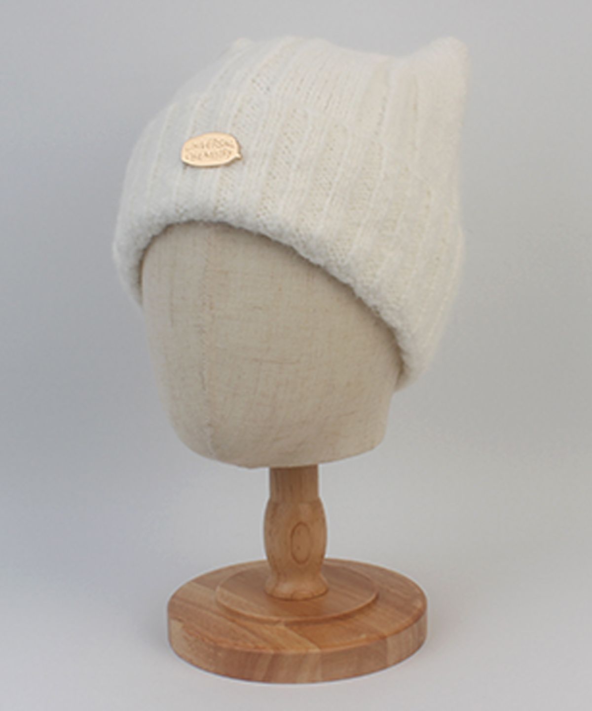 유니버셜 케미스트리(UNIVERSAL CHEMISTRY) Wool Cat Ivory Bubble Beanie 고양이비니