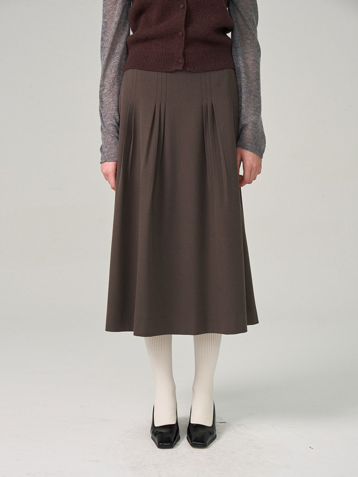 헌치(HUNCH) Soft Volume Tuck Detail Flare Skirt (2color)